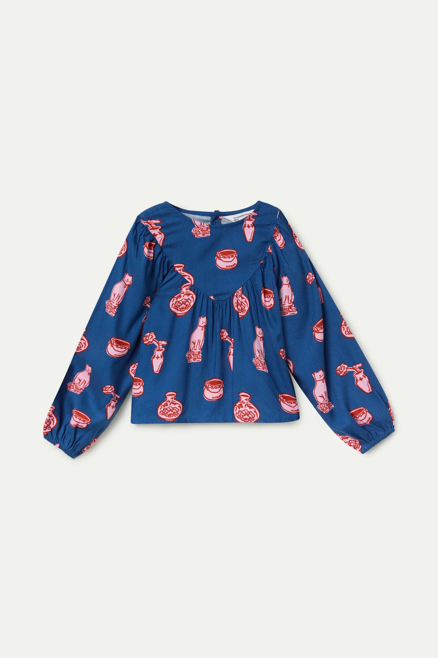 Blue long-sleeved girl's top with Porcelain print