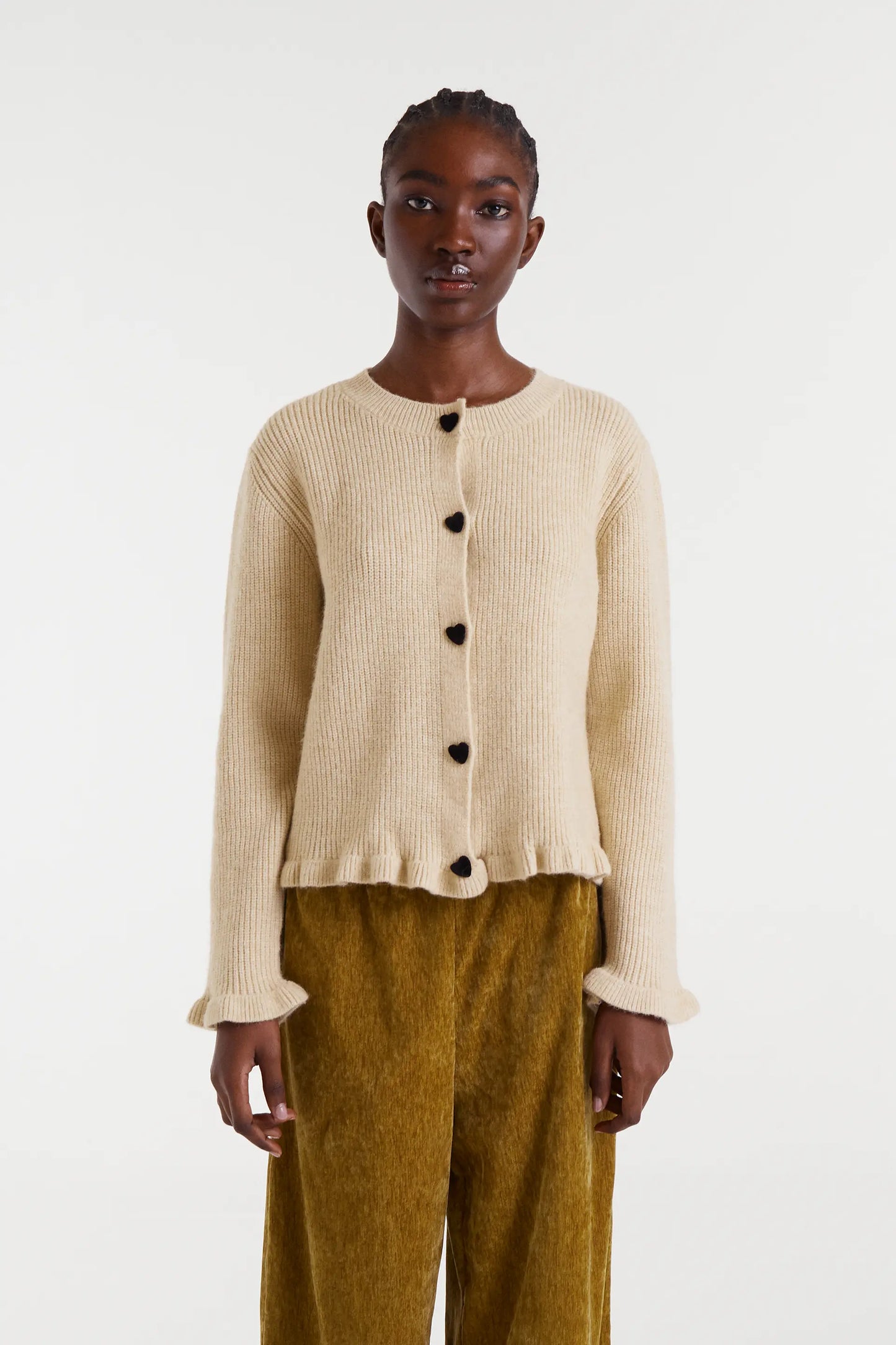 Cárdigan punto beige con detalle de corazones