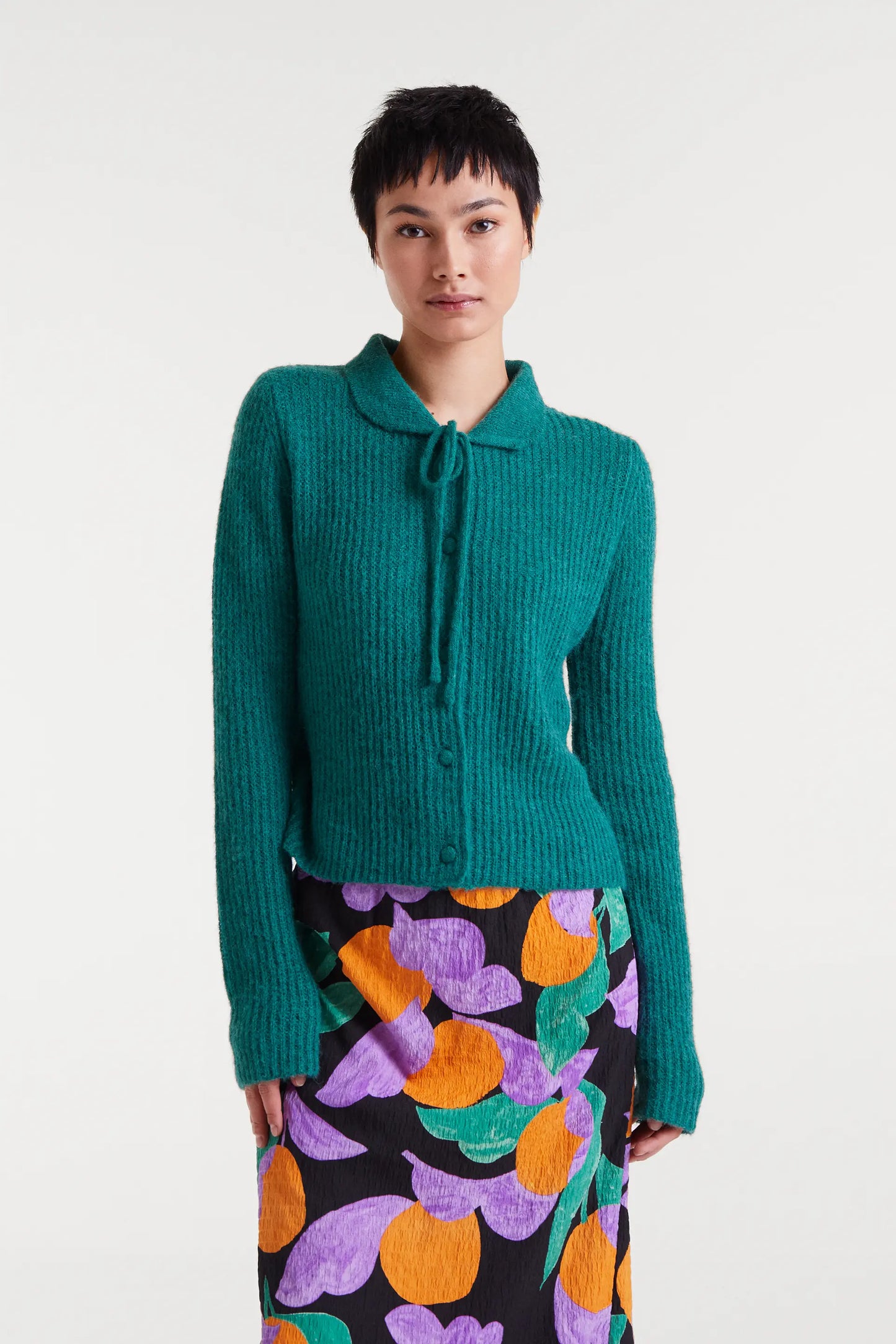 Cardigan in maglia con fiocco turchese