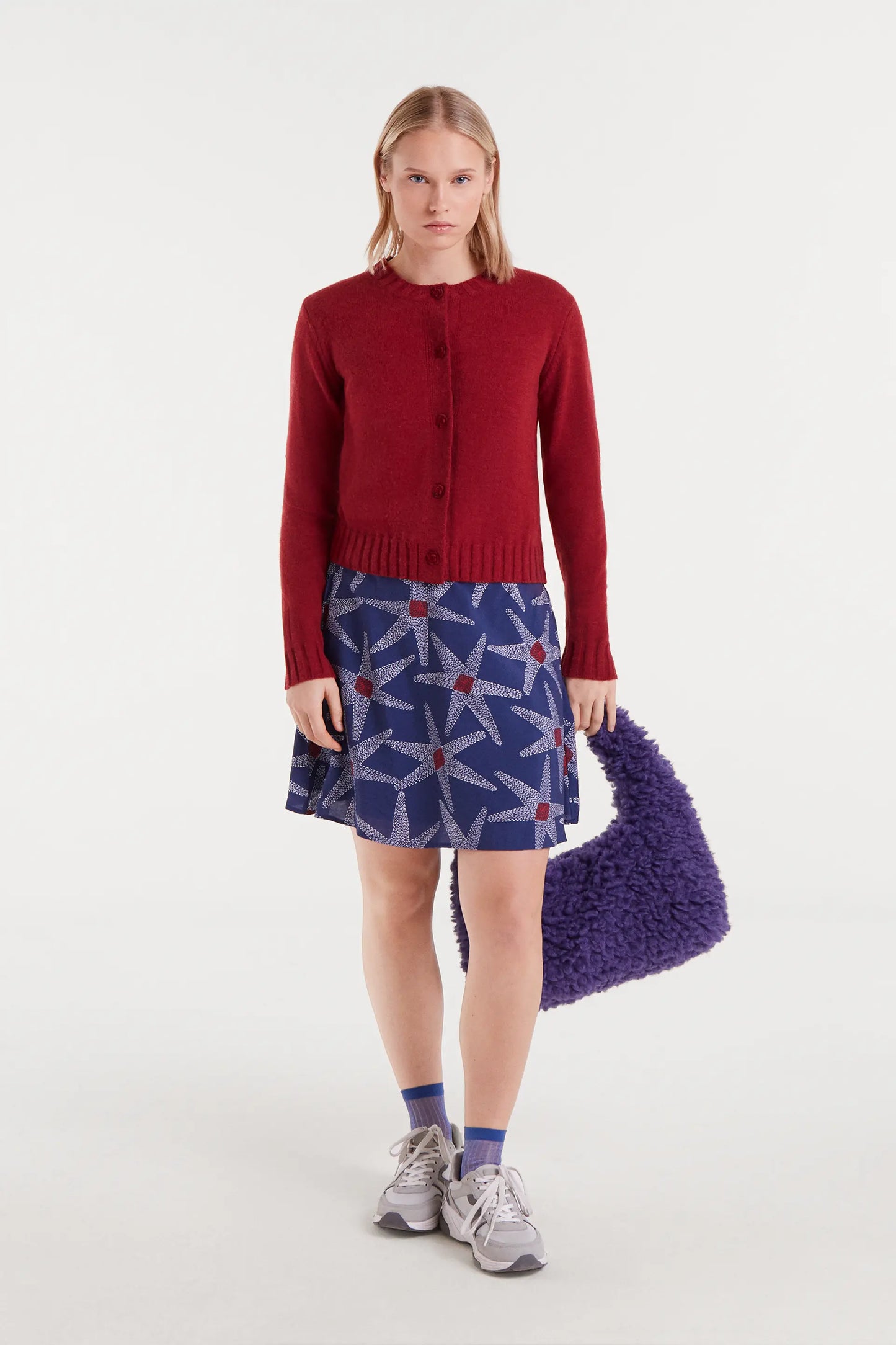 Cárdigan de punto rojo