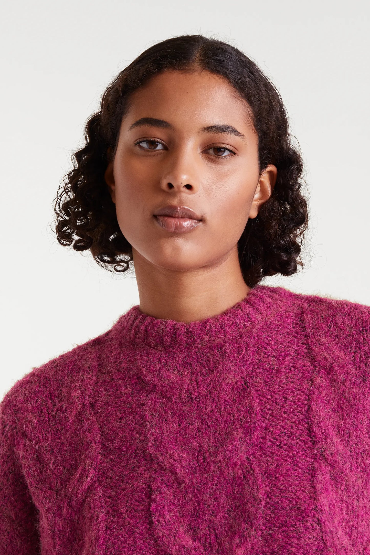 Maglione fucsia a maglia a catena