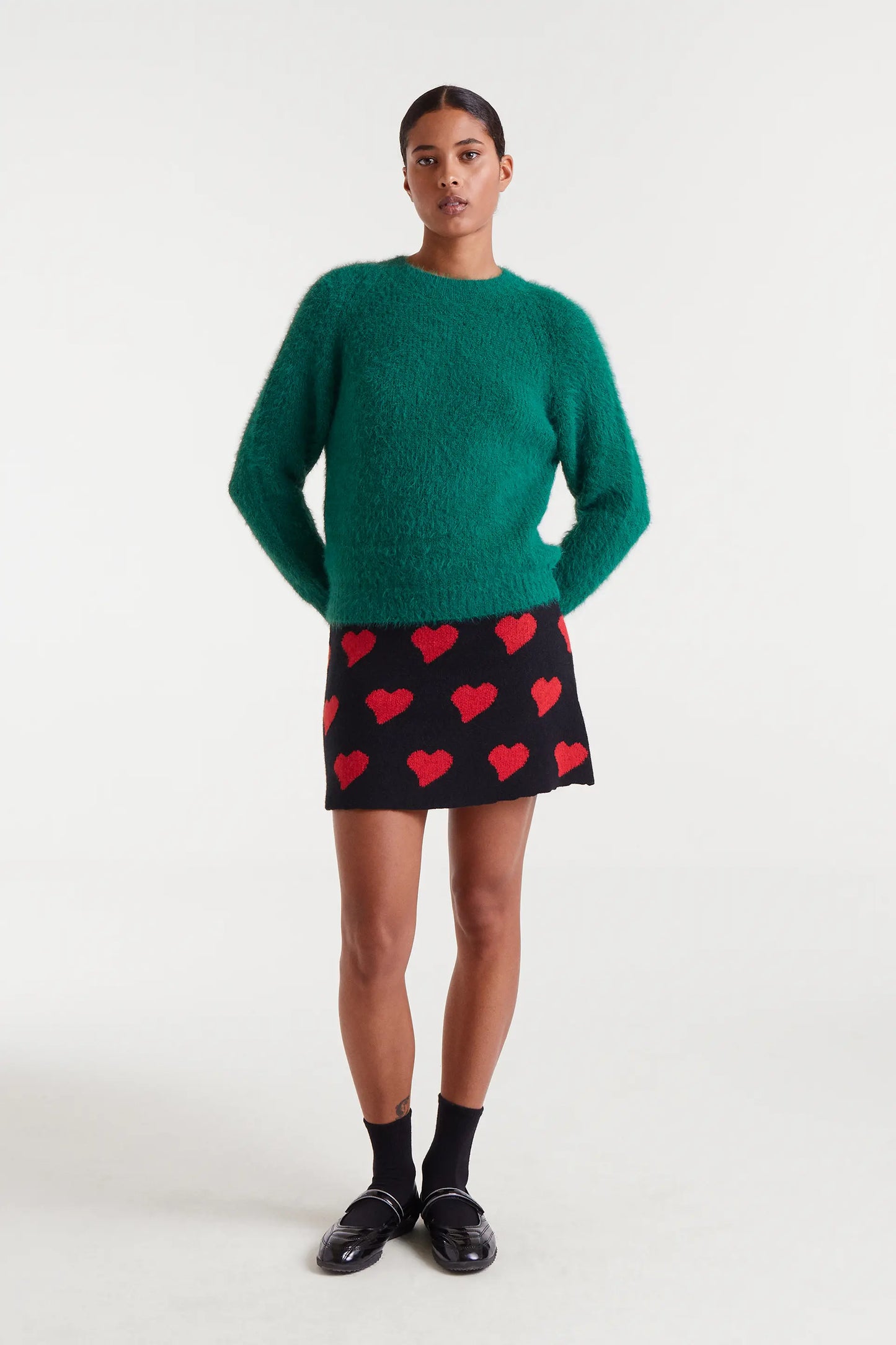 Maglione lavorato a maglia verde testurizzato