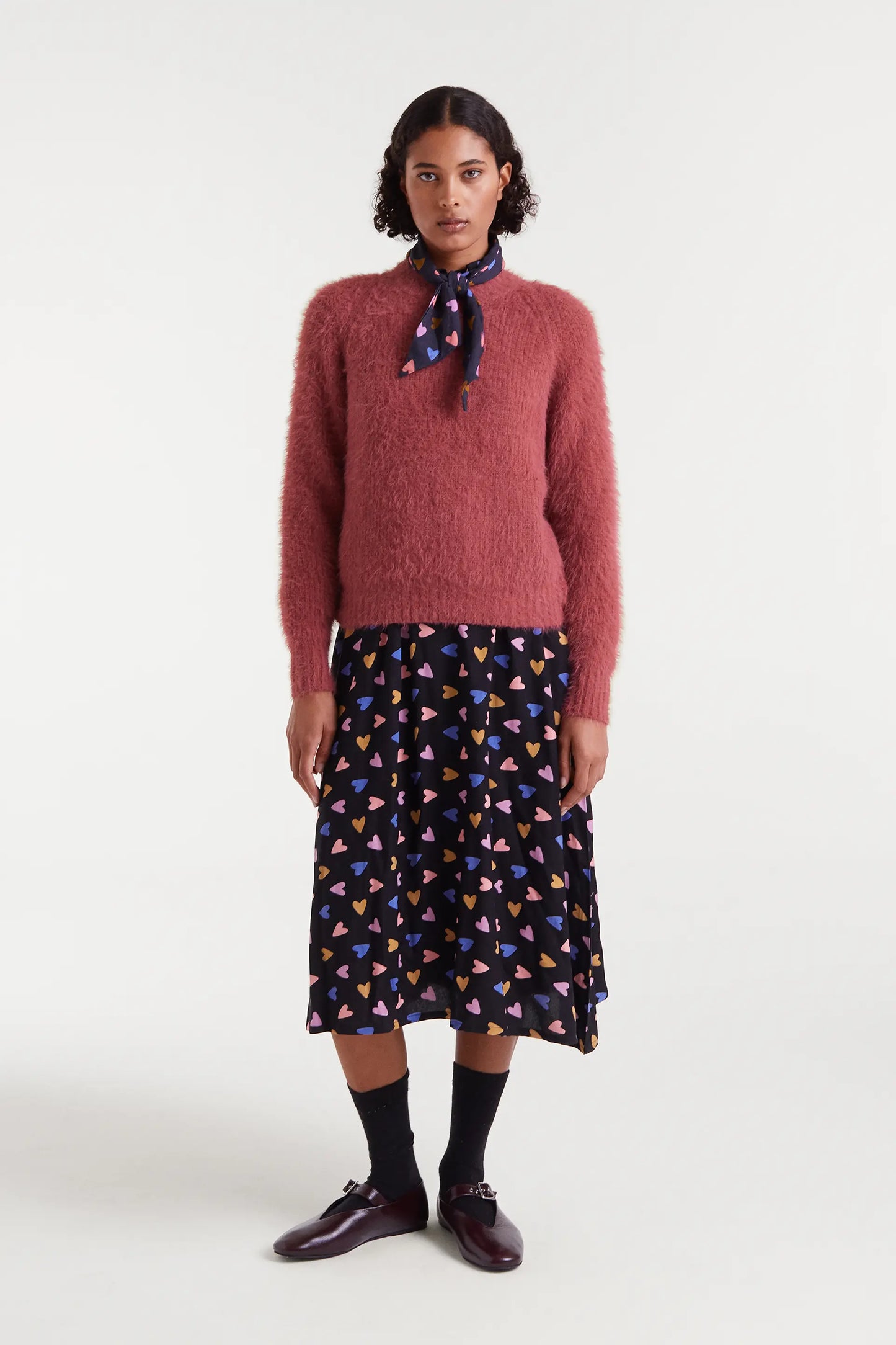 Maglione lavorato a maglia rosa testurizzato