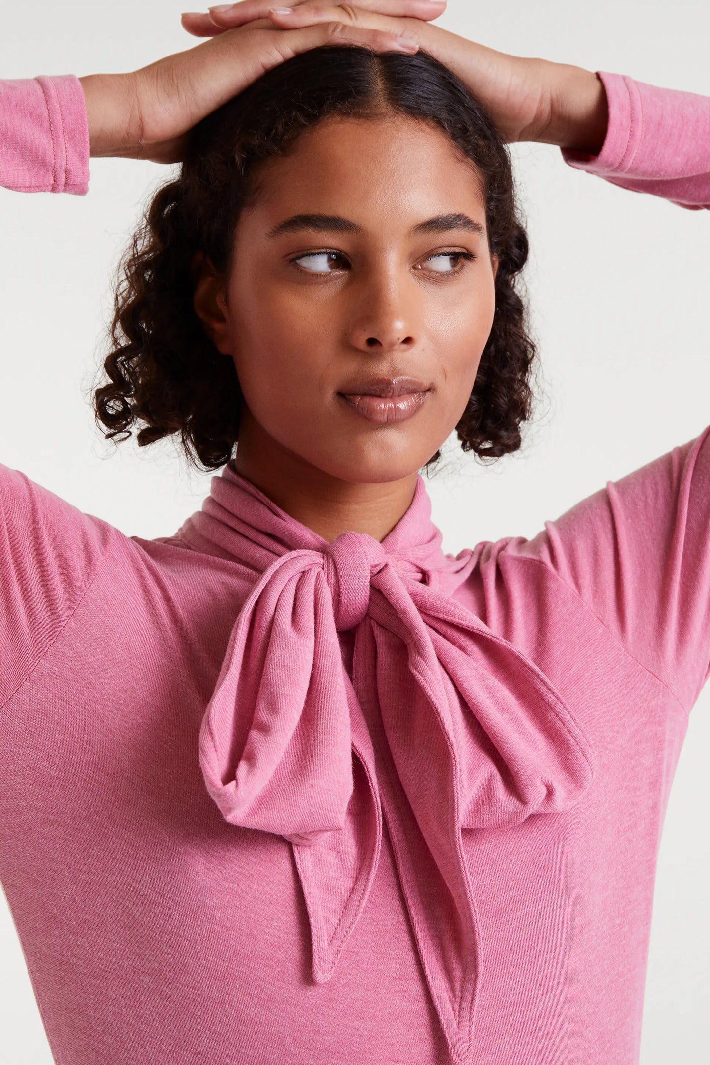 Pink long-sleeved lace-up shirt