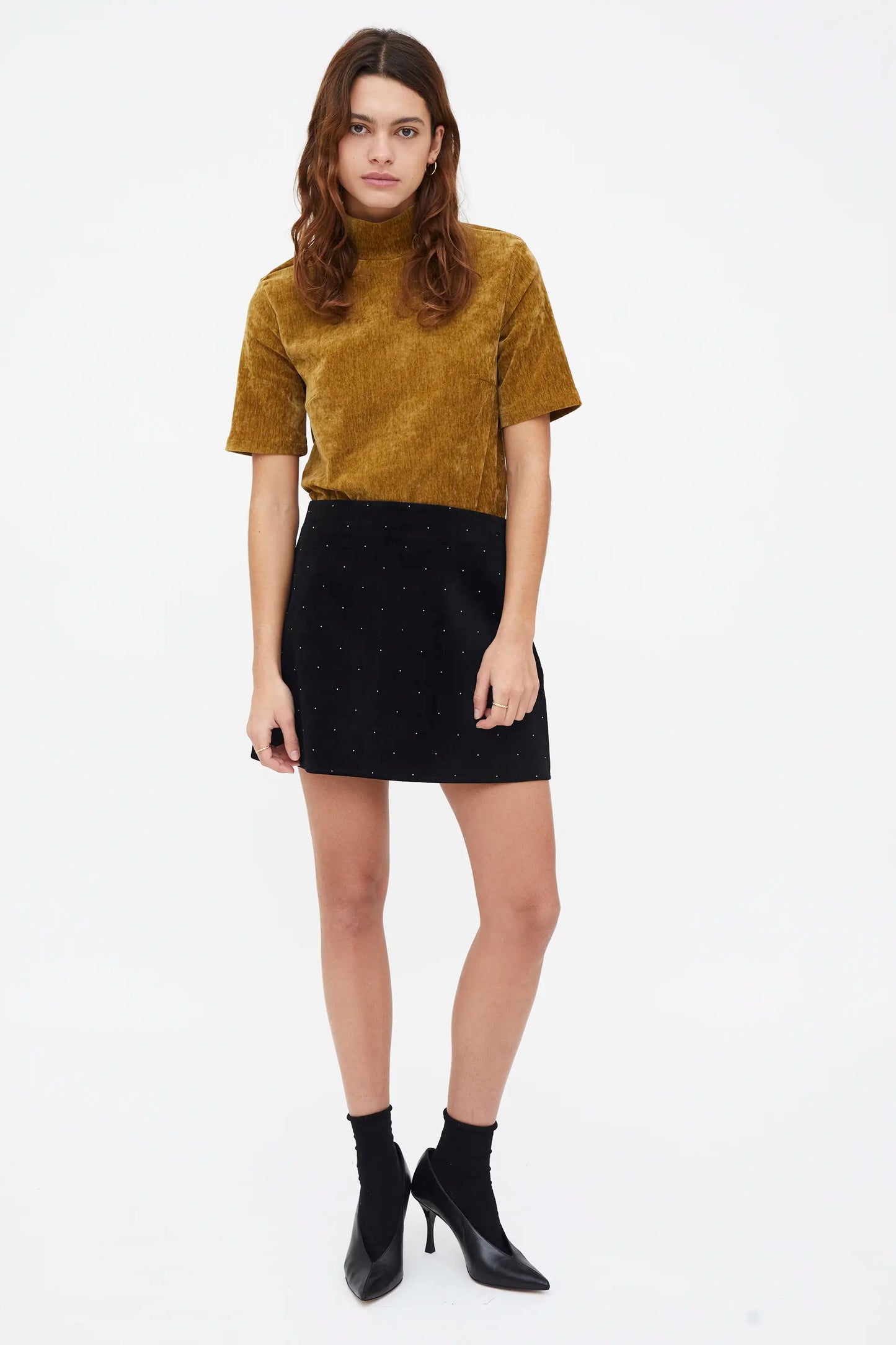 Short black velvet skirt