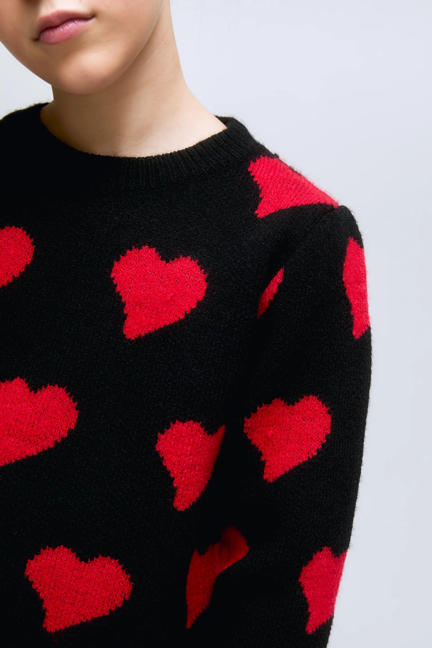 Girl's black sweater with red heart print Heart Attack