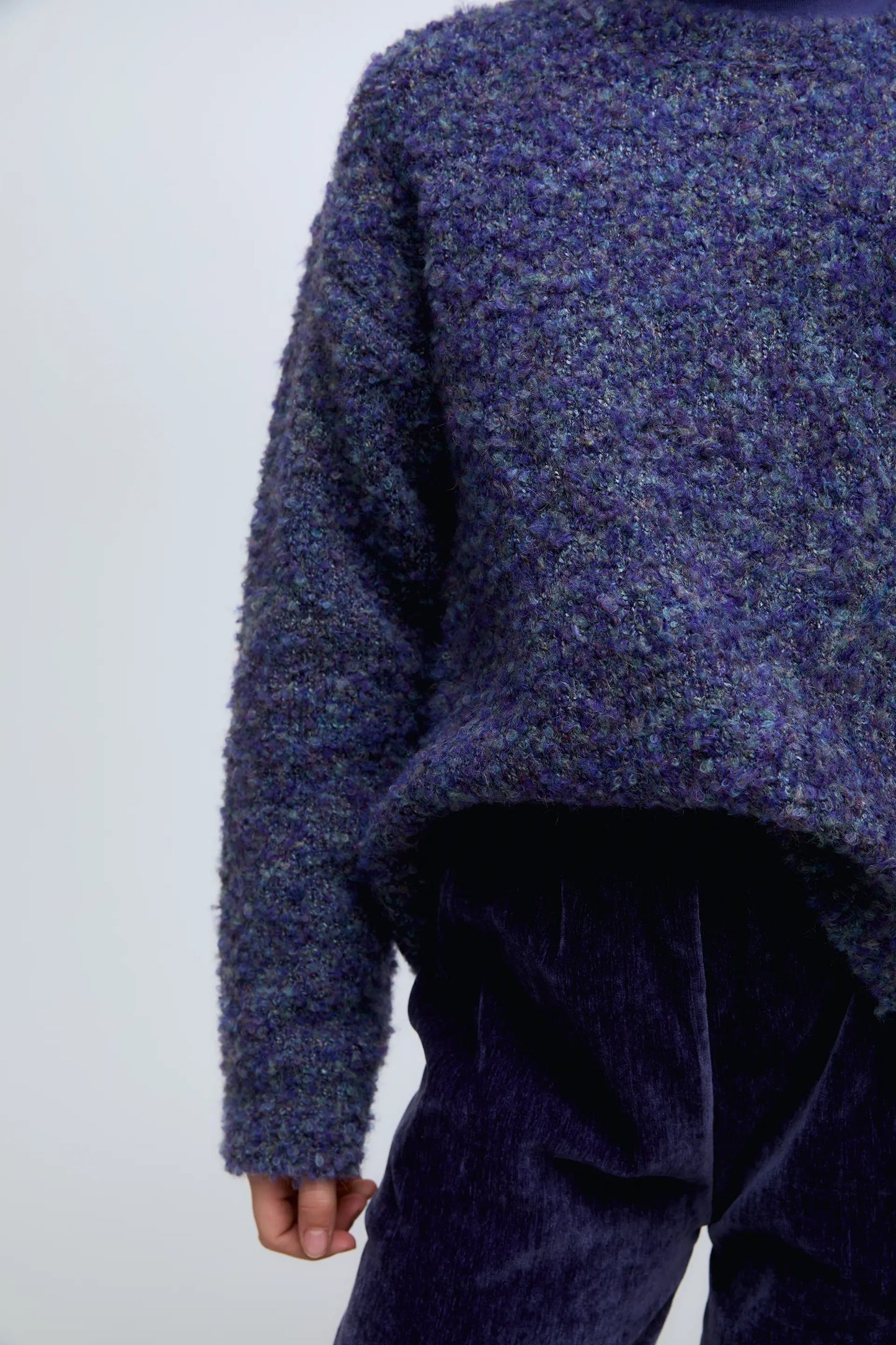 Girl's blue sweater with a mottled finish