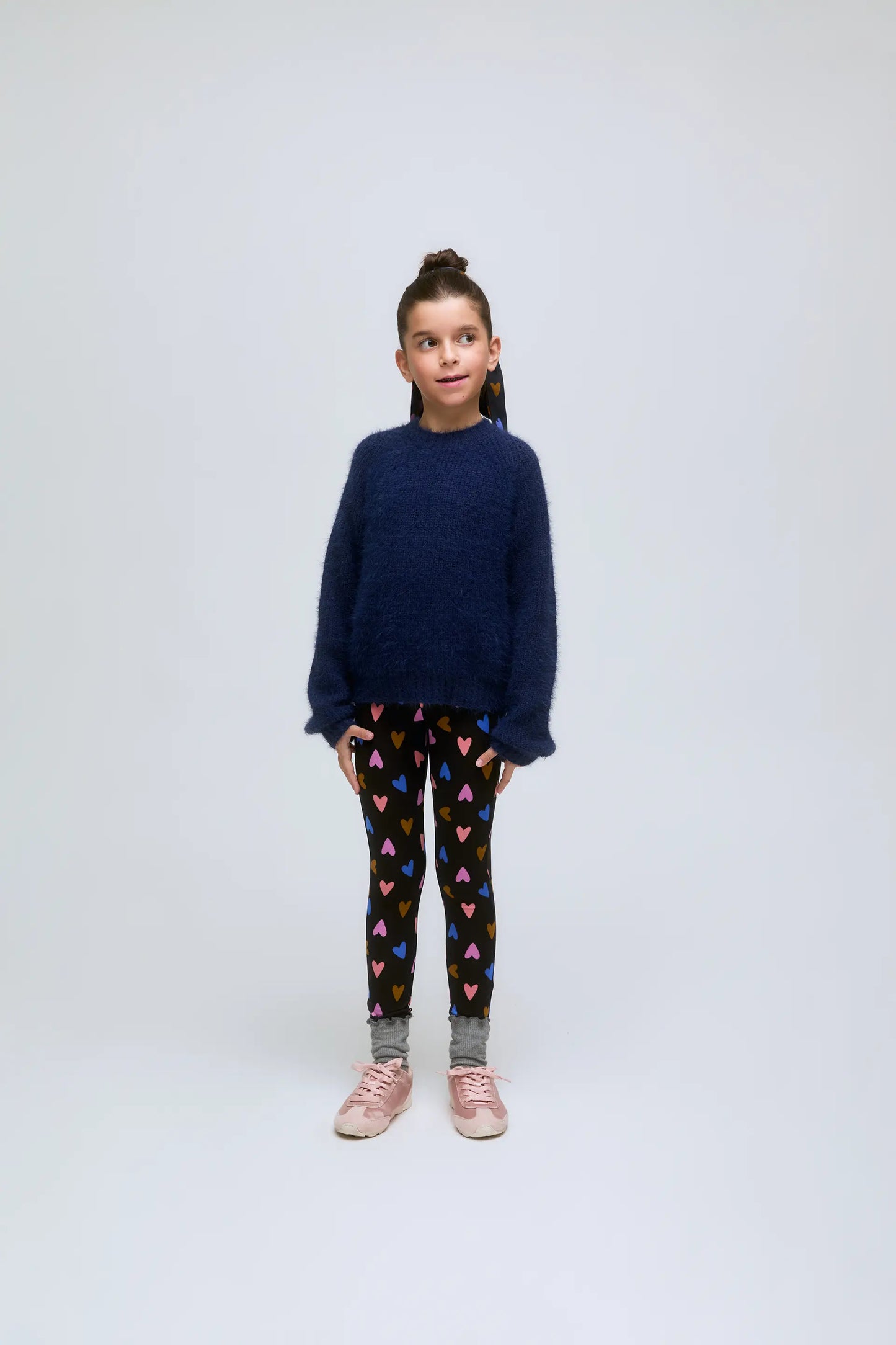 Blue knitted girl's sweater.