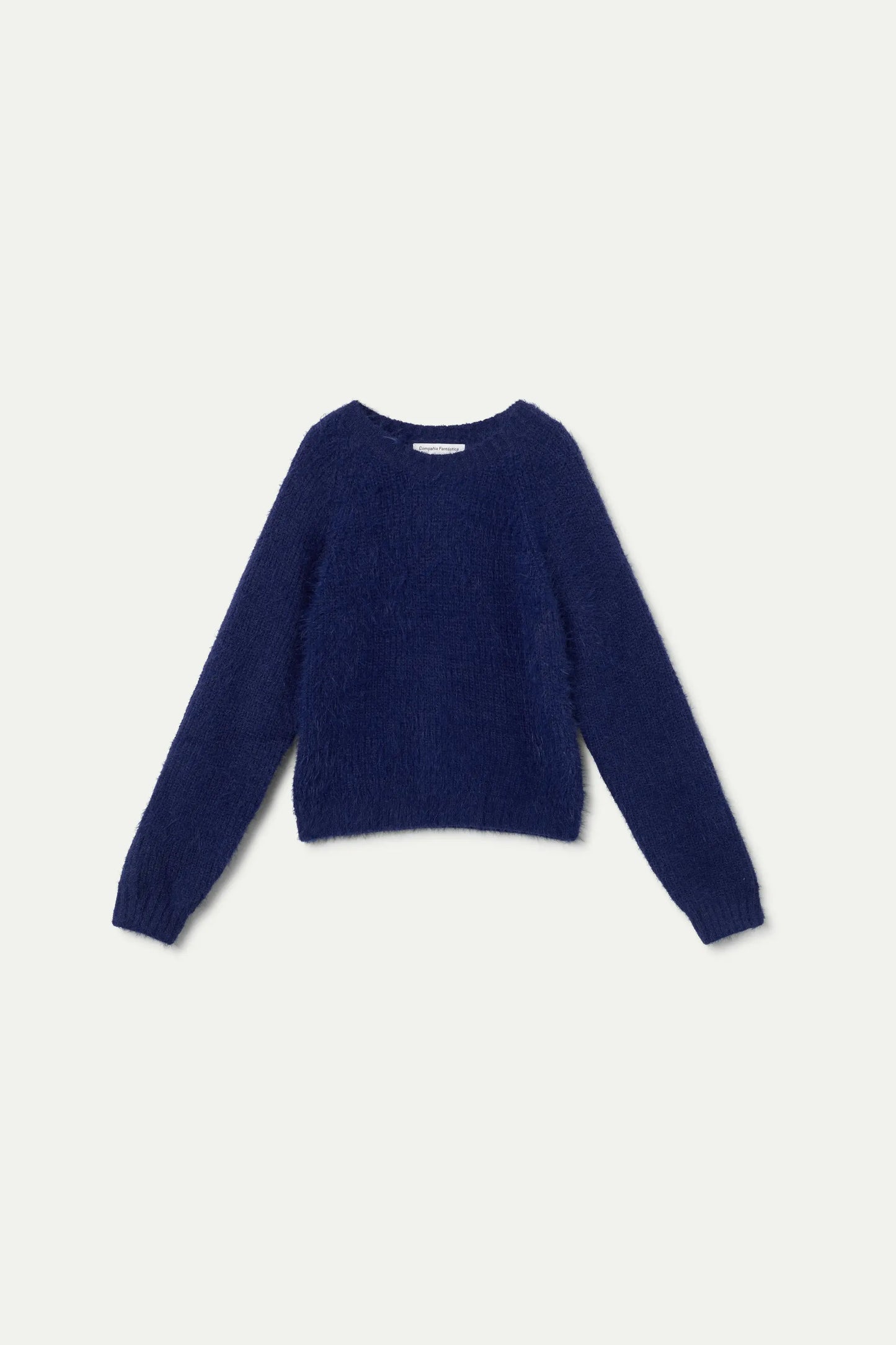 Blue knitted girl's sweater.
