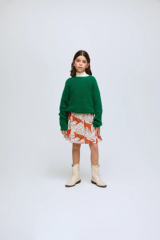 Jersey verde de niña de punto.