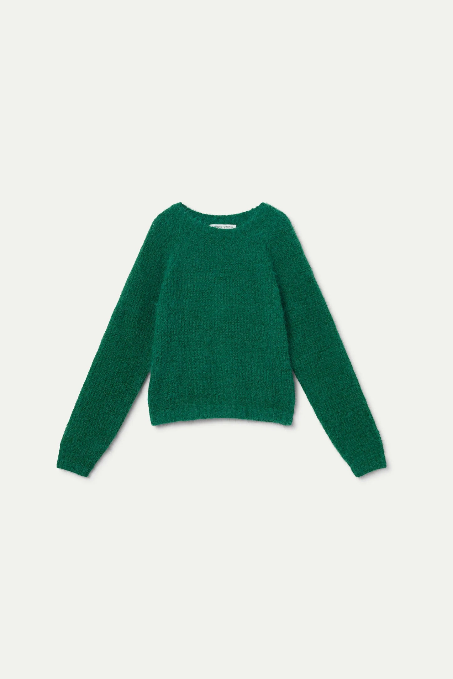 Green knitted girl's sweater.