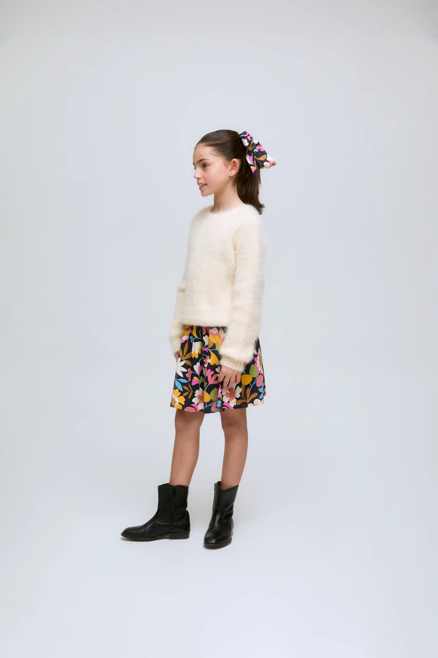 White knitted girl's sweater