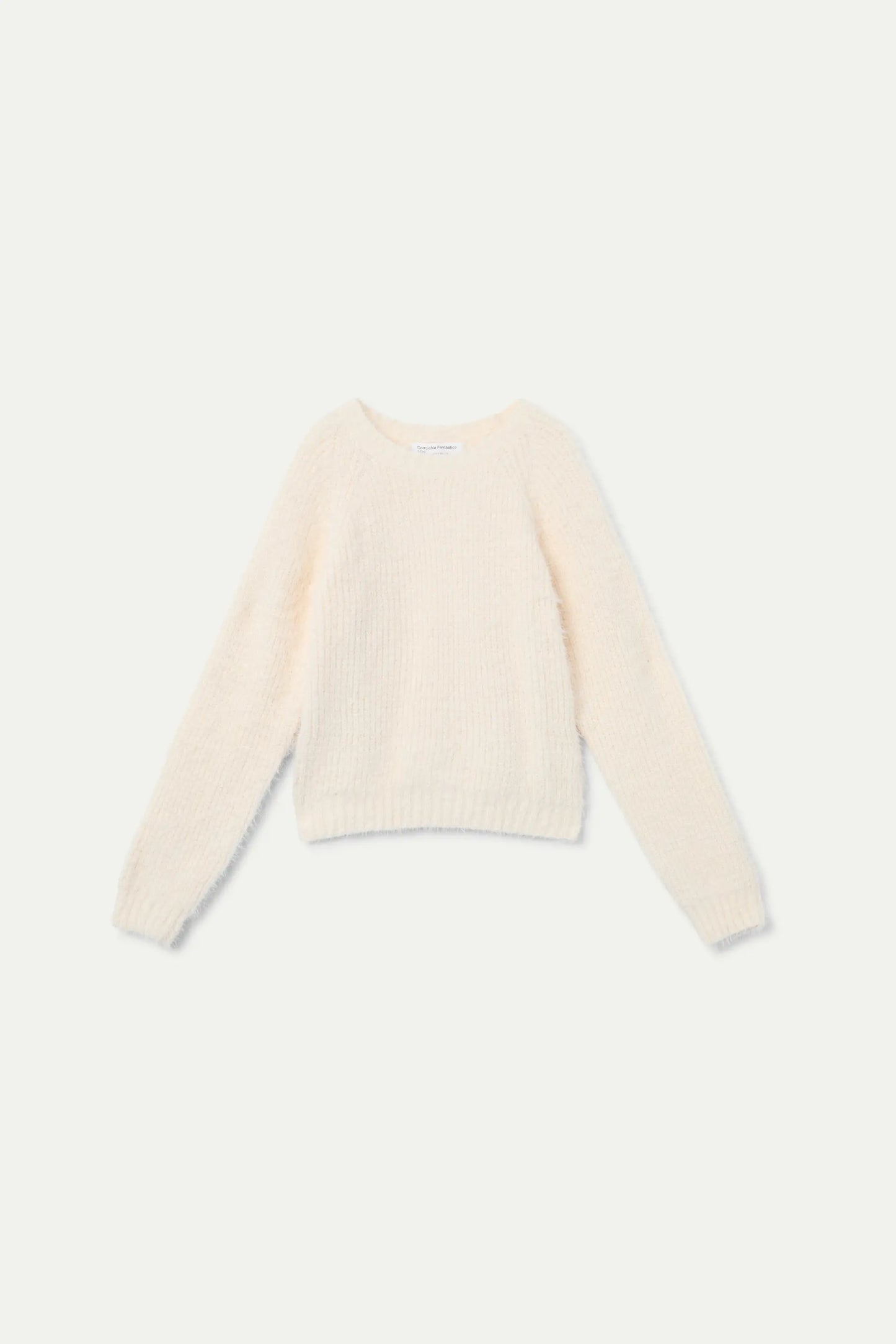 White knitted girl's sweater