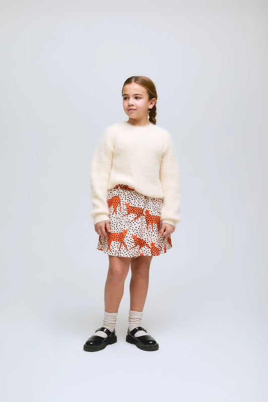 Falda corta  de niña con estampado Tano