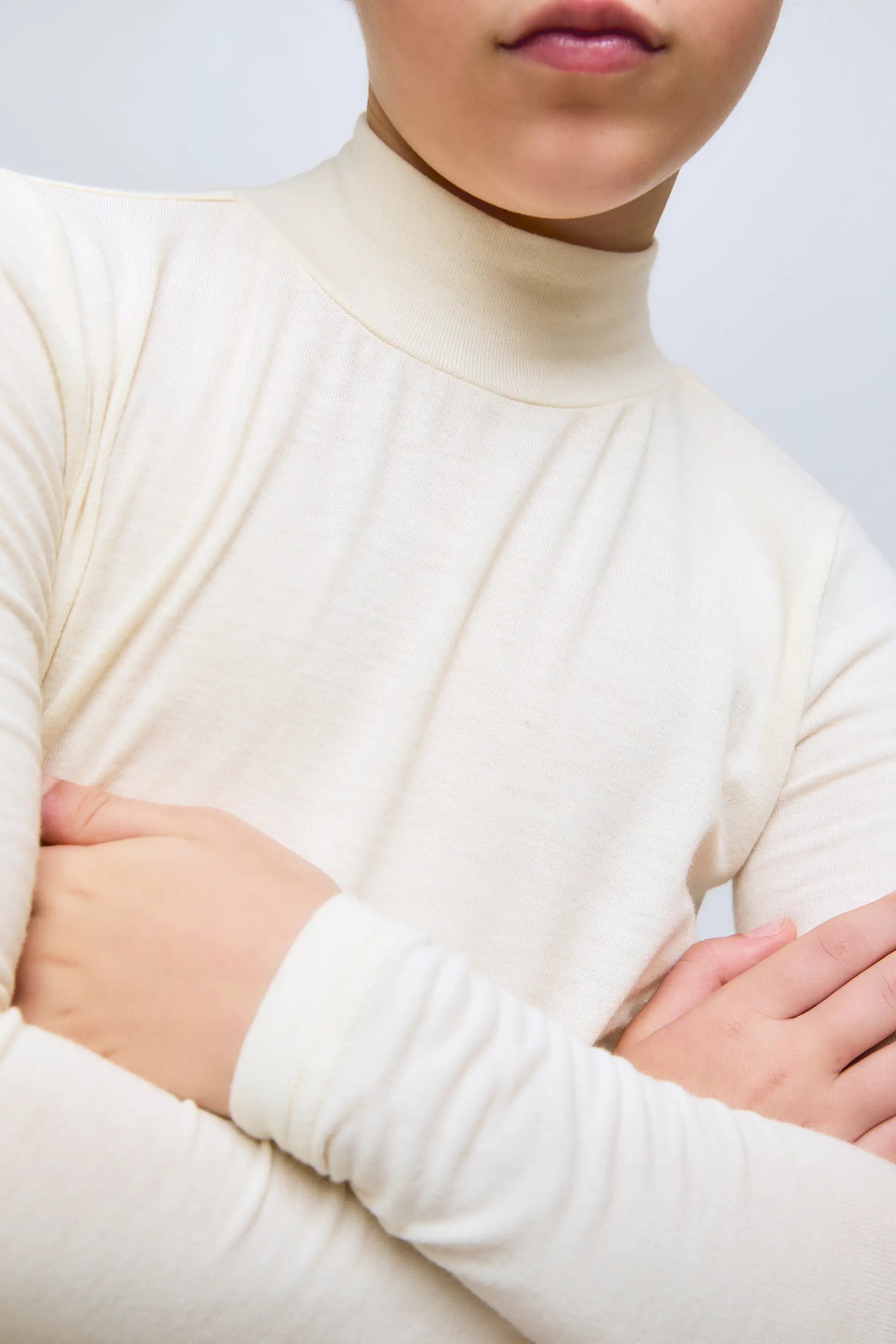 White turtleneck girl's sweater