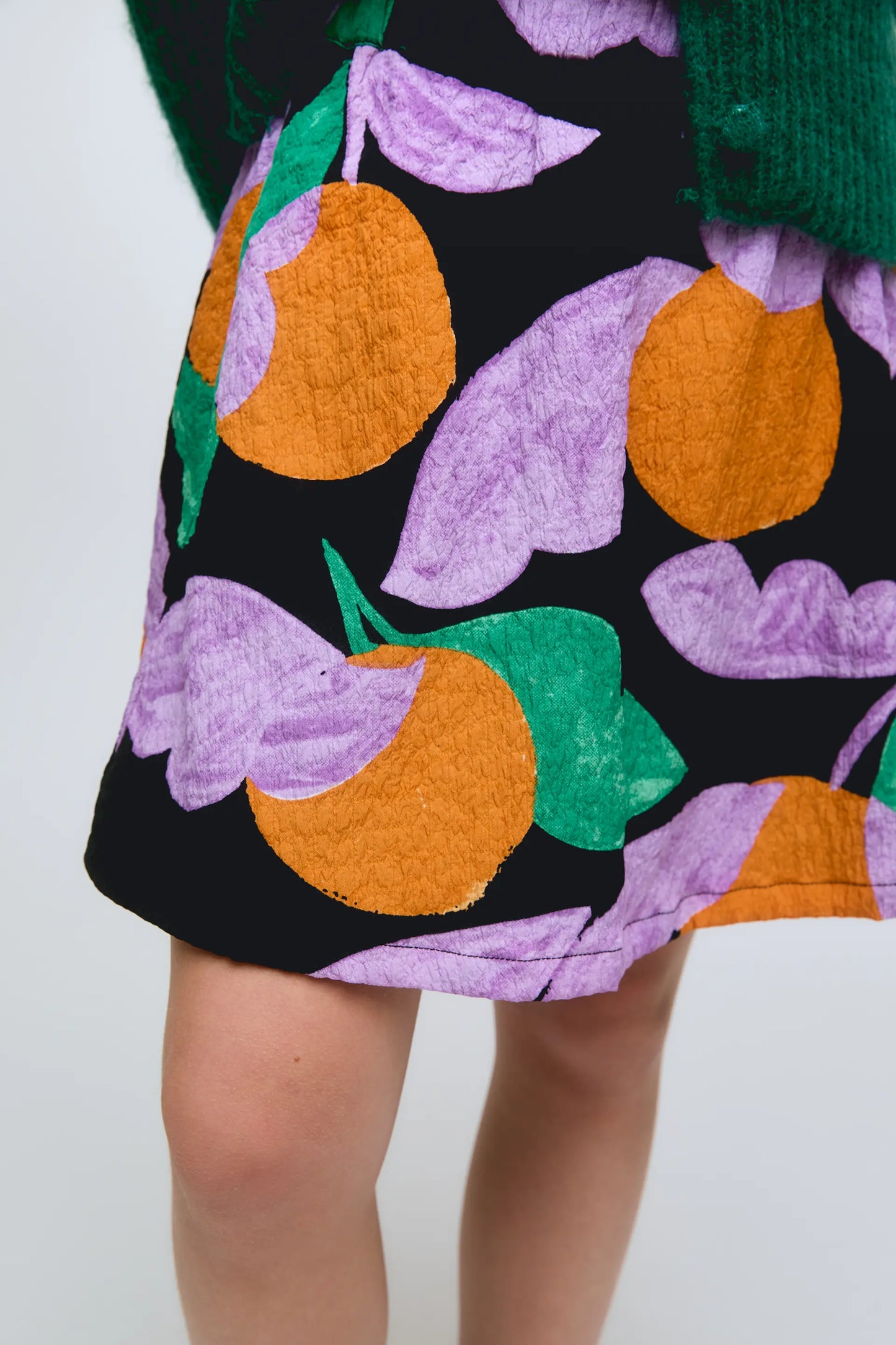 Gonna corta da bambina con stampa di frutta albicocca