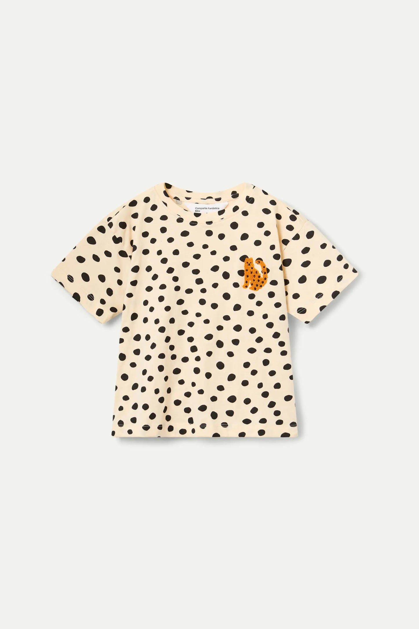 Maglietta da bambina con stampa a pois neri e leopardata