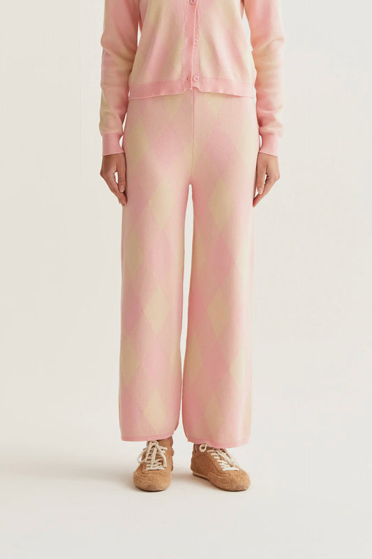 Pantaloni in maglia con stampa a rombi rosa