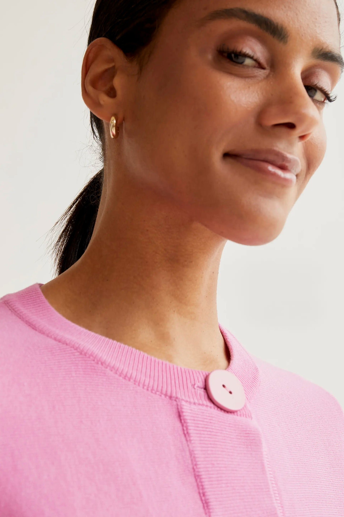 Pink button-down knit cardigan