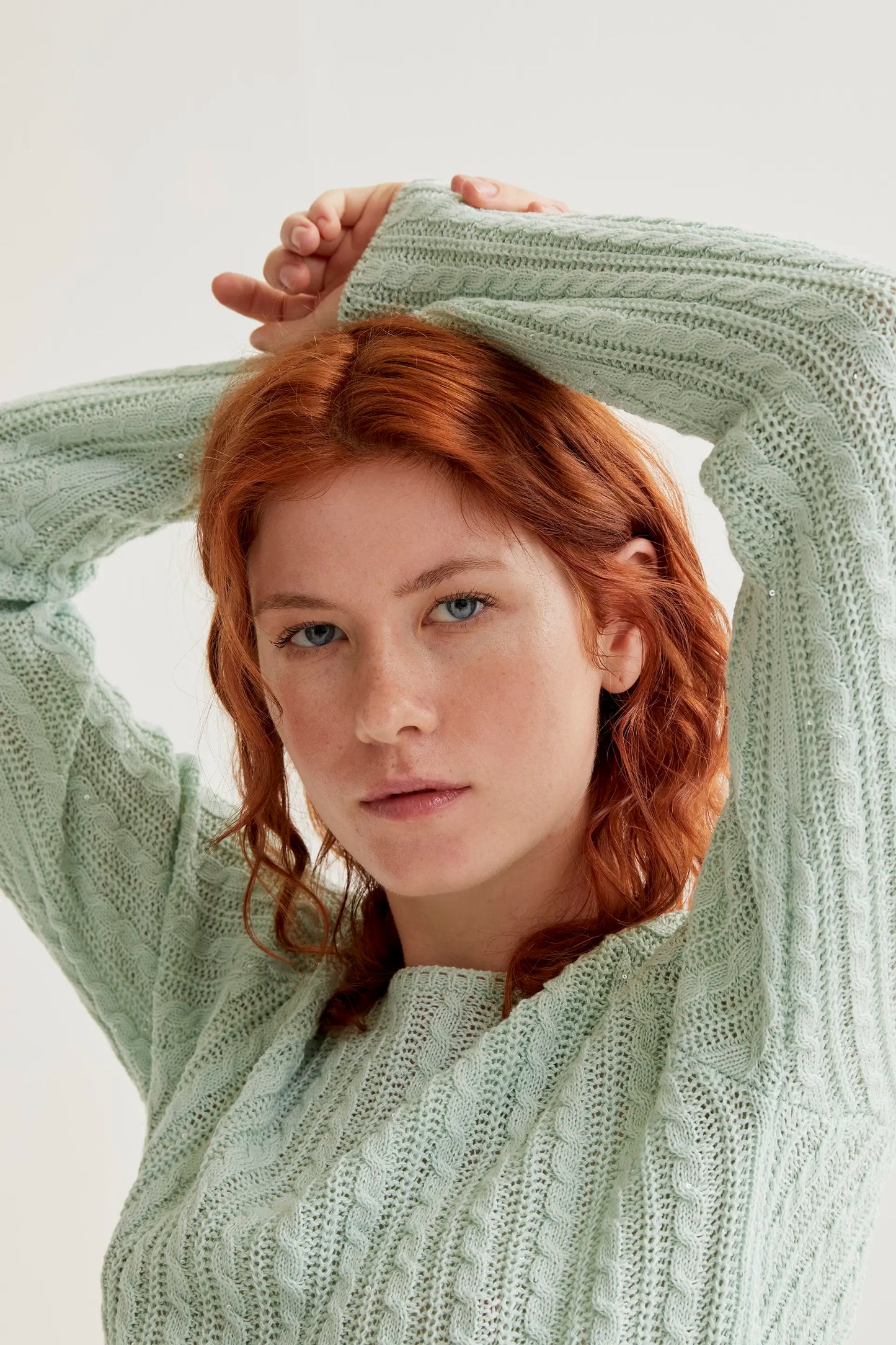 green chain stitch sweater