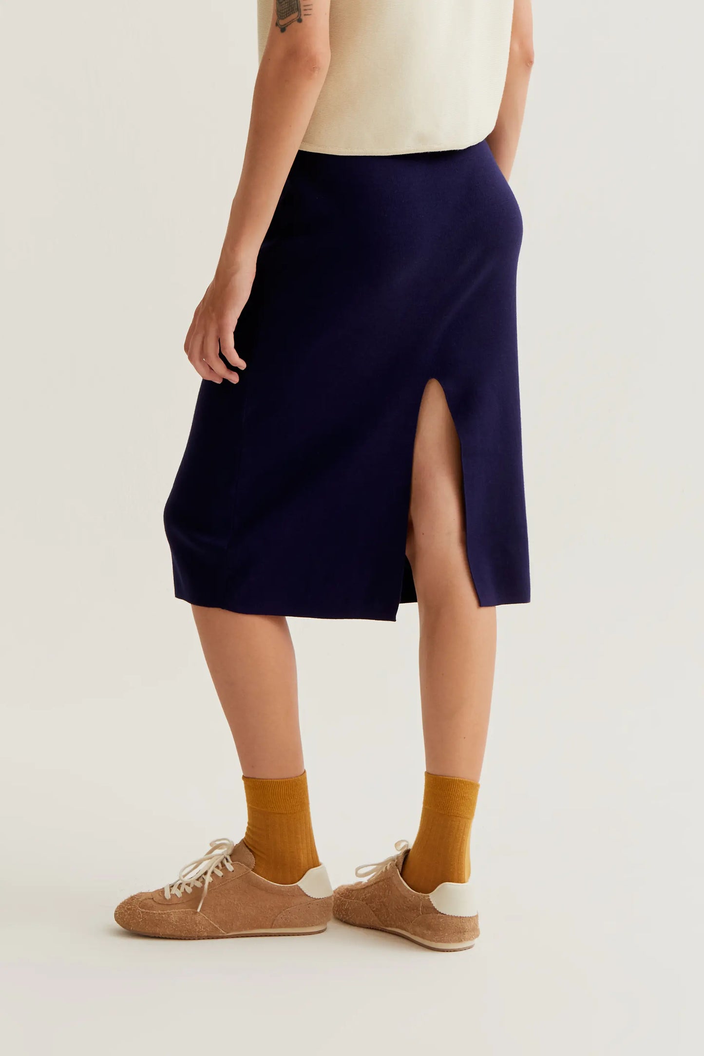 Falda midi punto azul marino