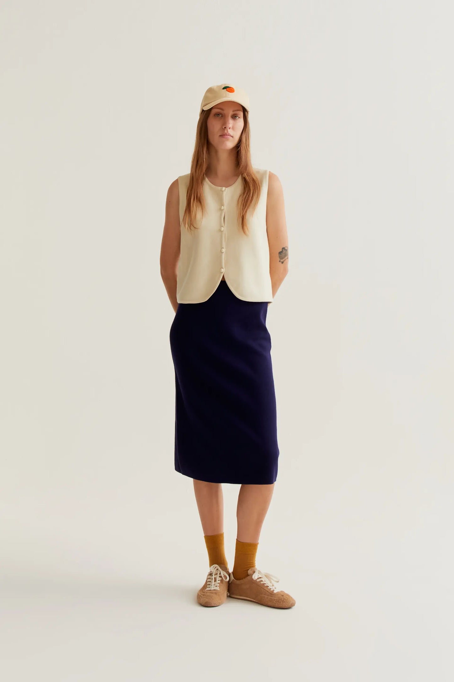 Falda midi punto azul marino