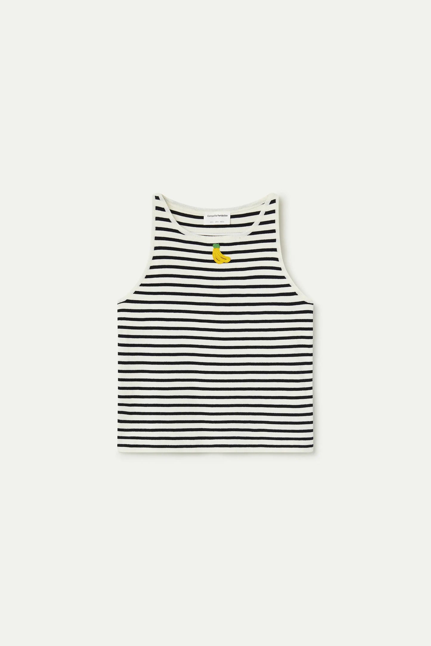 Top de rayas blanco y negro con bordado de banana