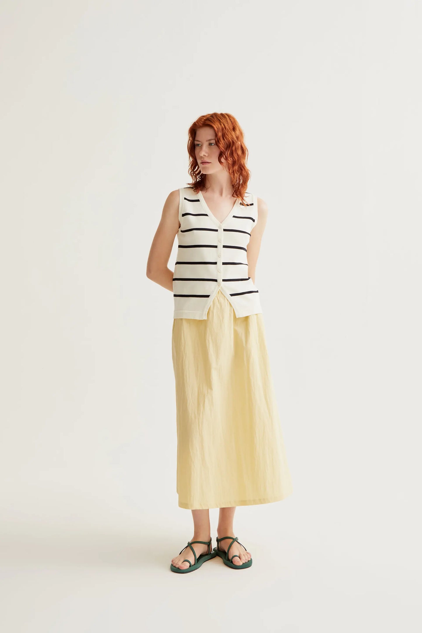 Knitted vest with black and white striped print