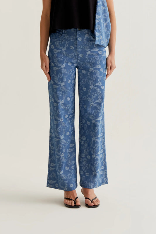 Blue jeans with paisley print