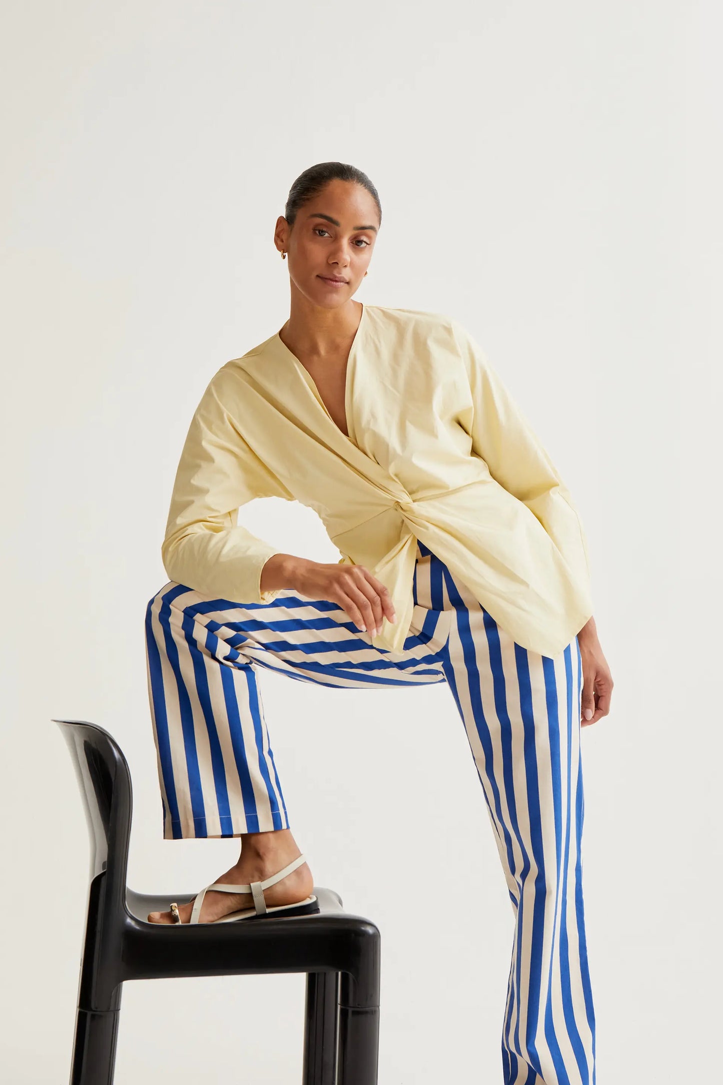 Light yellow draped top