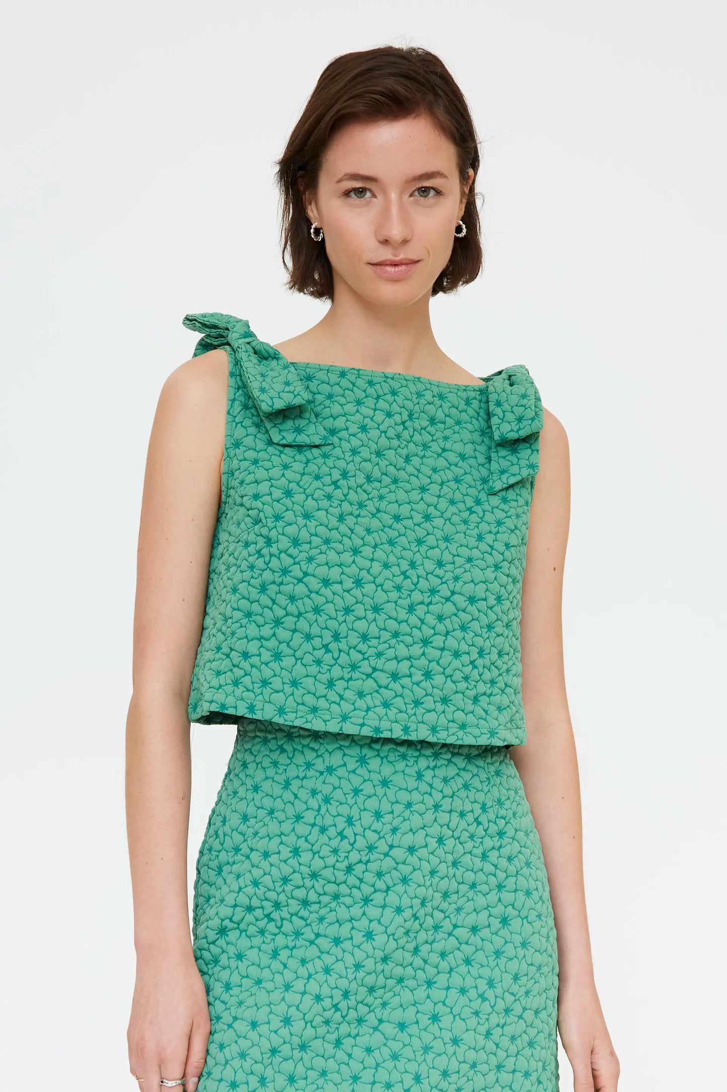 Top con trama floreale verde