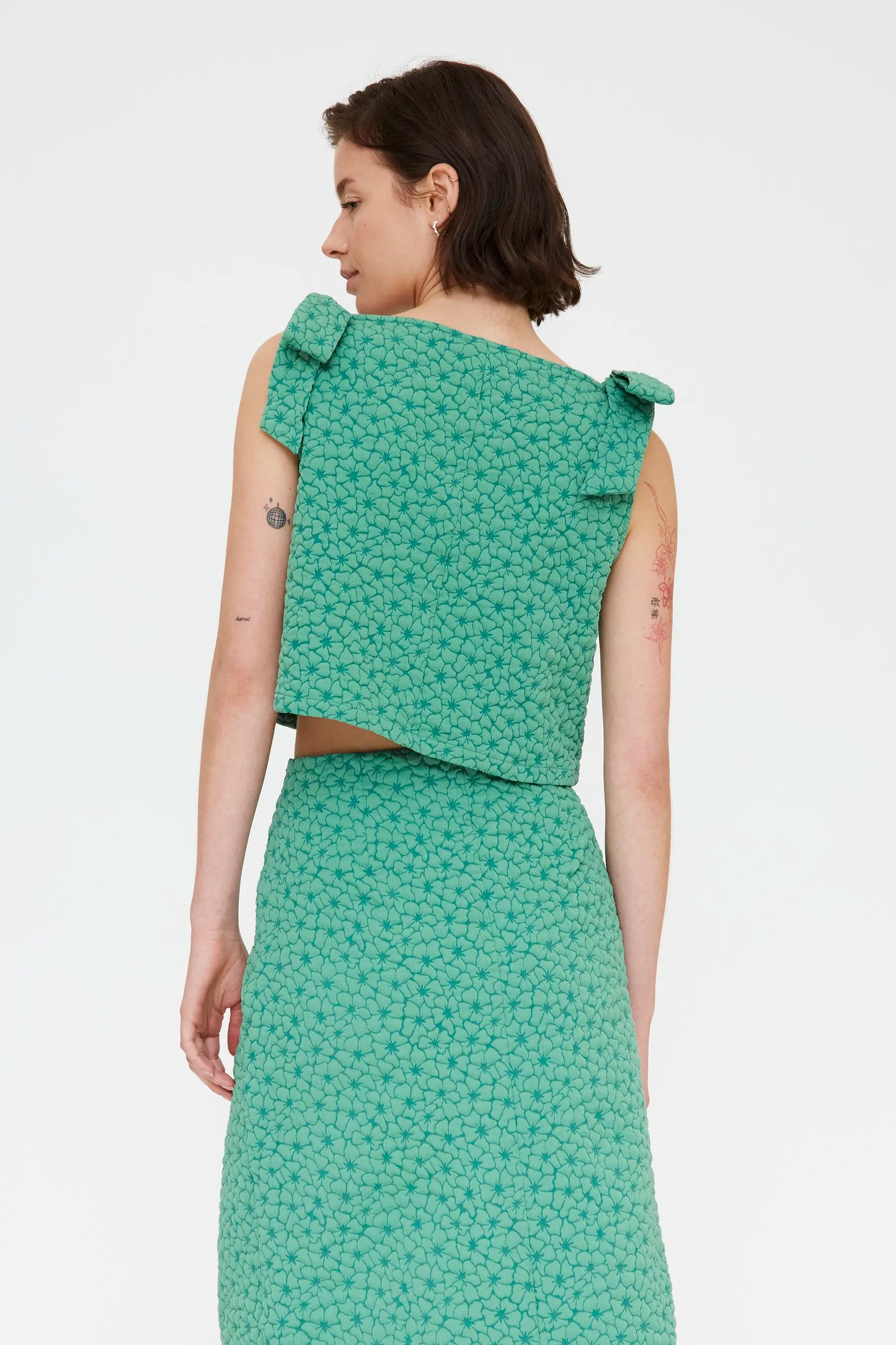 Top con trama floreale verde