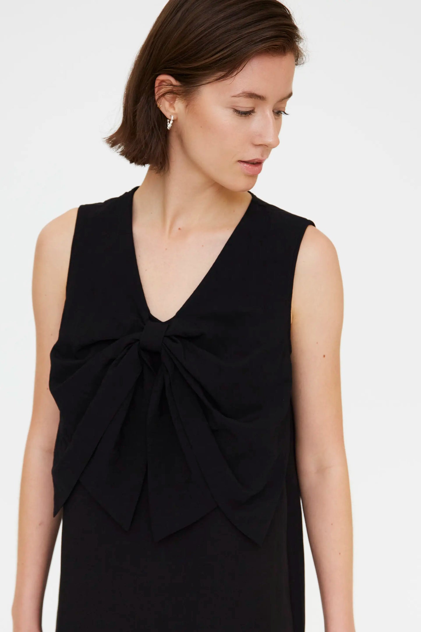 Short black dress with tie detail