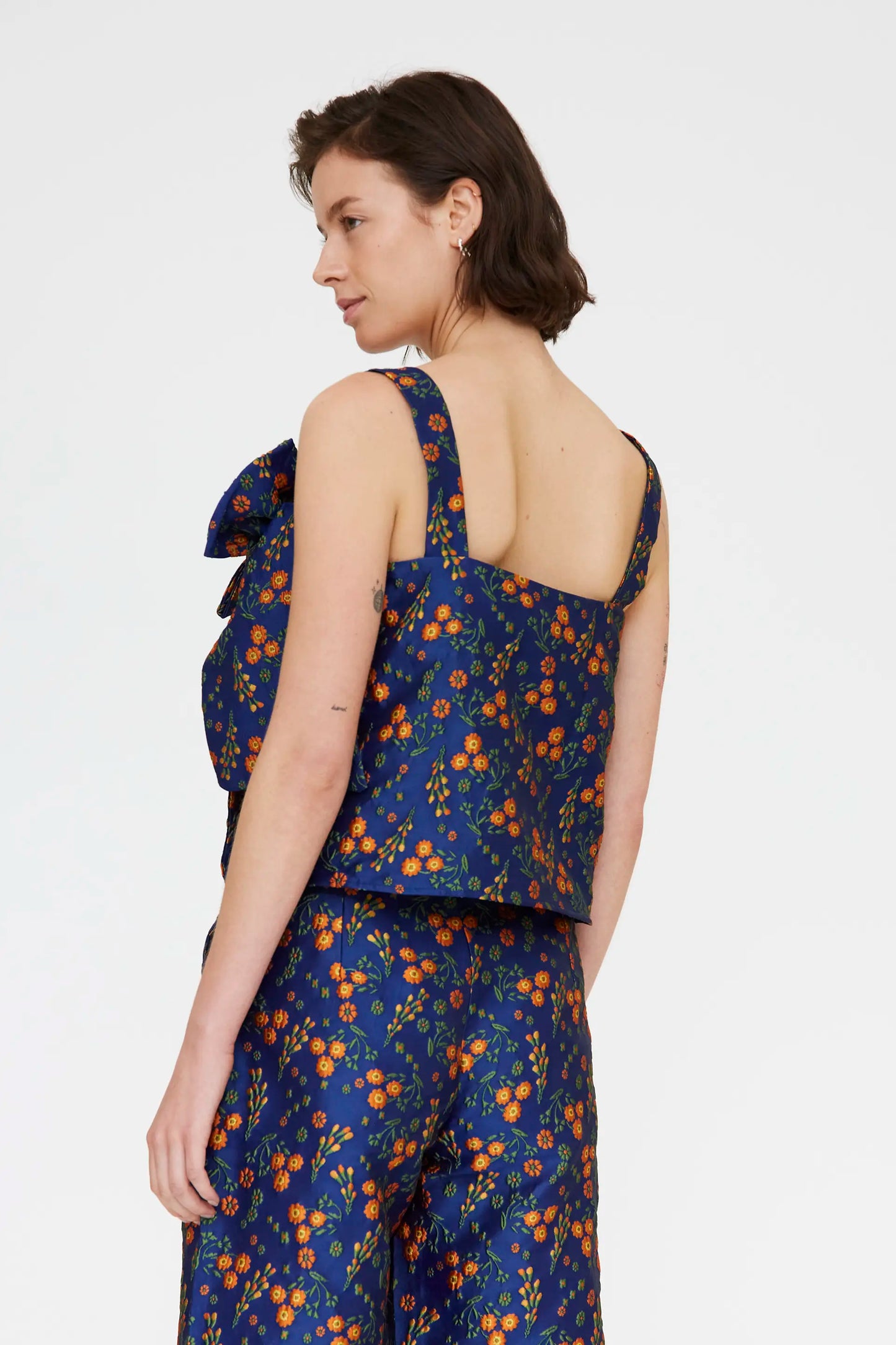 Top con stampa jacquard a fiori