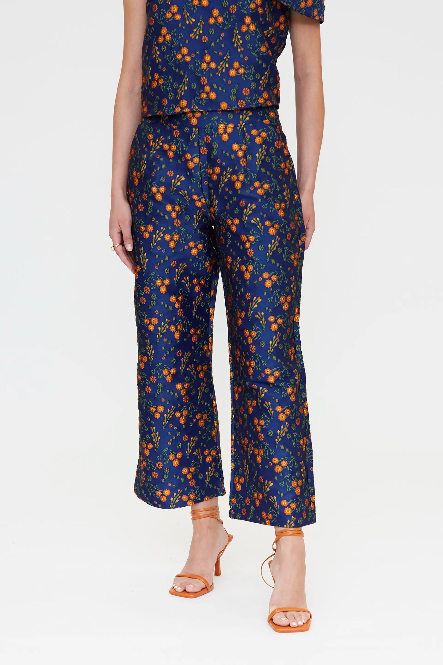 Pantaloni con stampa jacquard a fiori