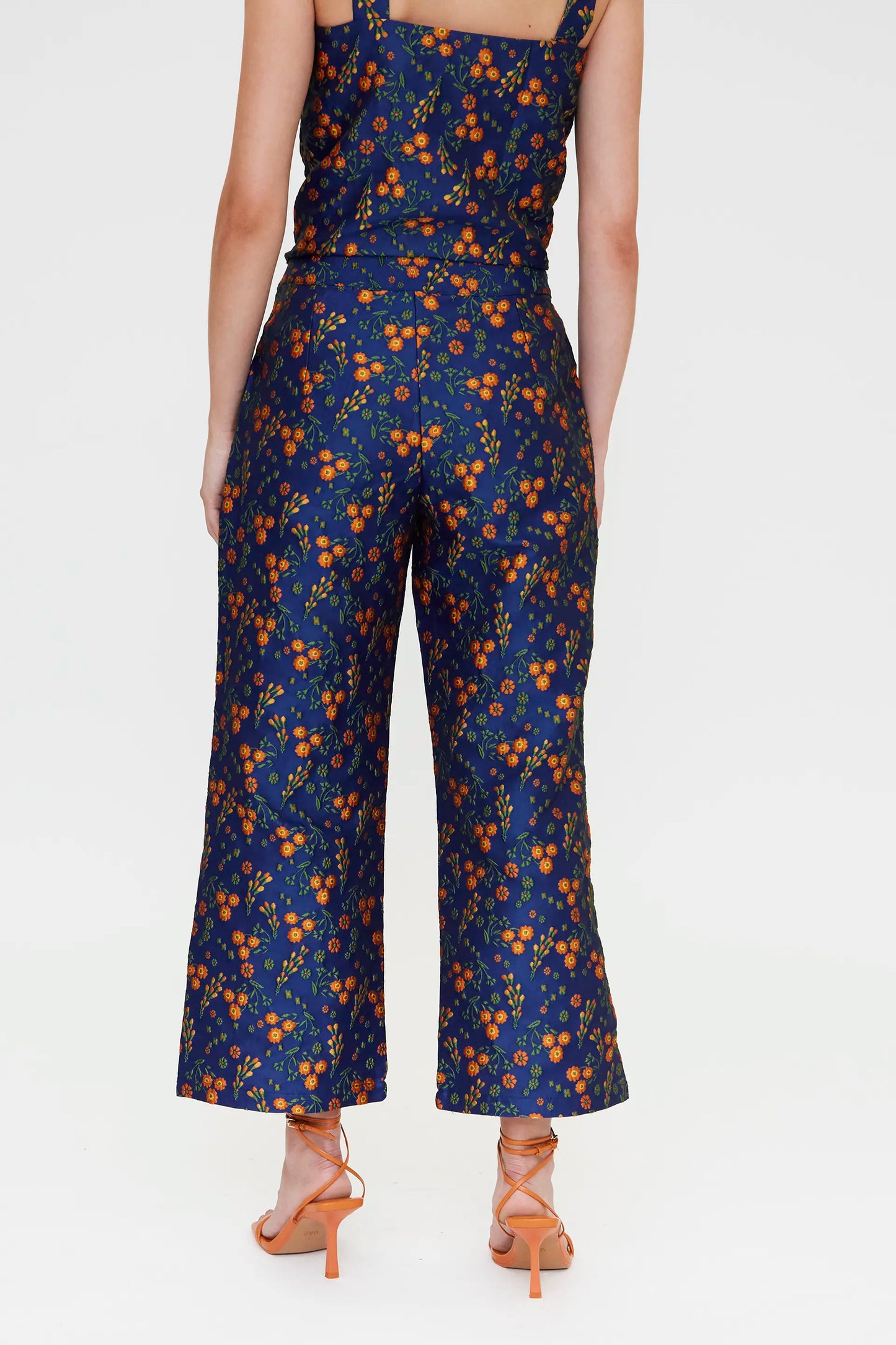 Pantaloni con stampa jacquard a fiori