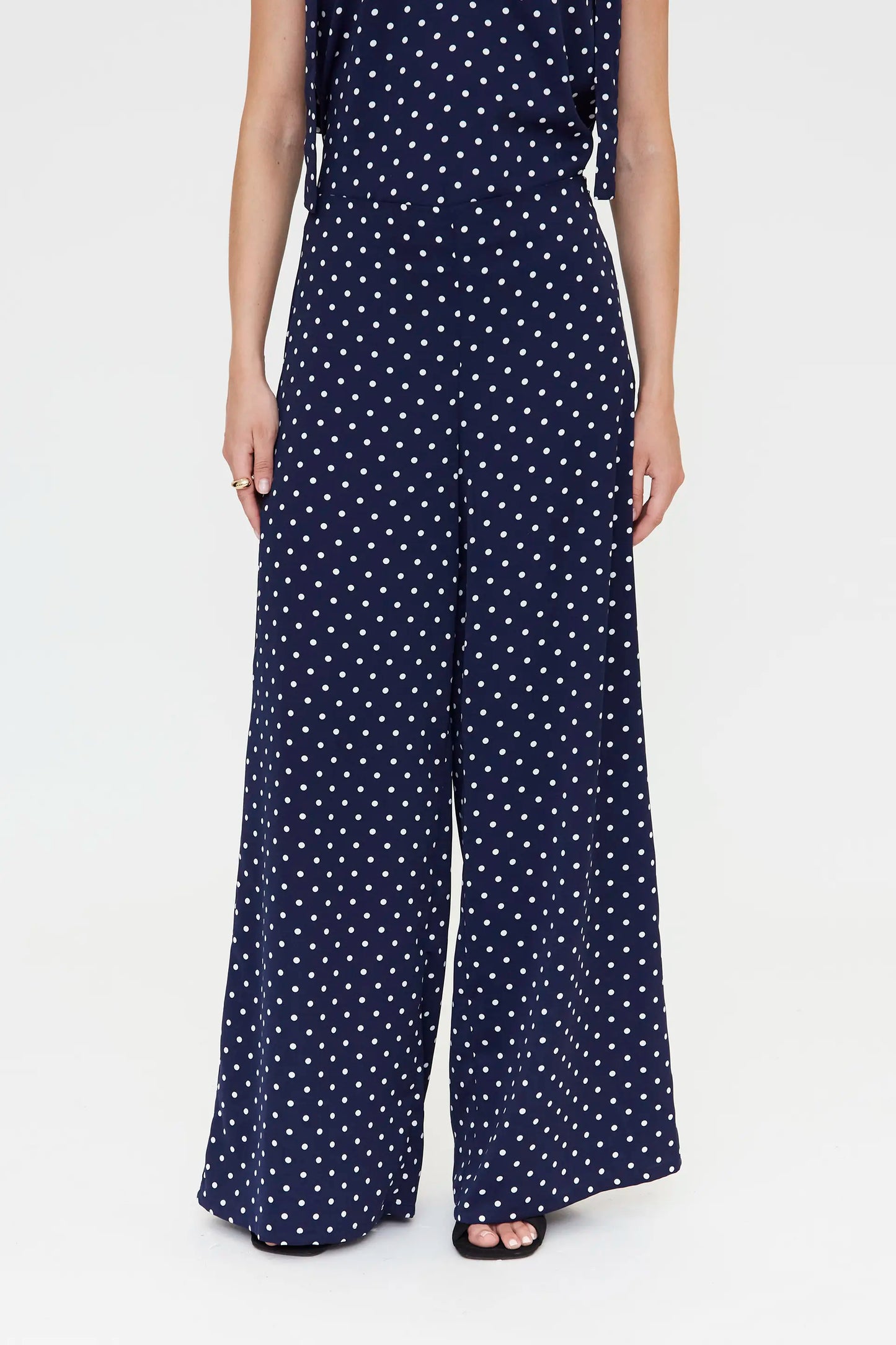 Pantaloni con stampa a mini pois blu navy