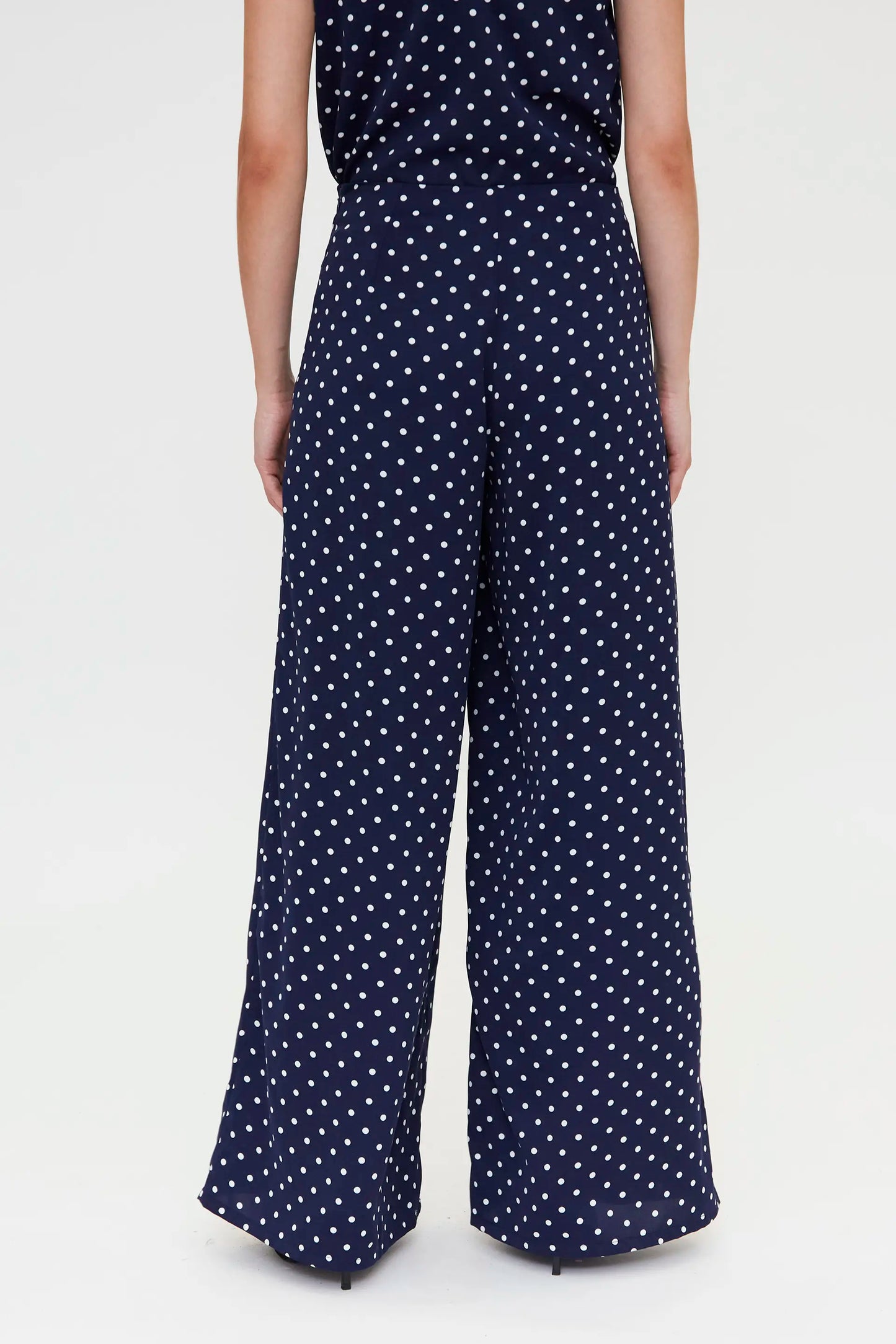 Pantaloni con stampa a mini pois blu navy