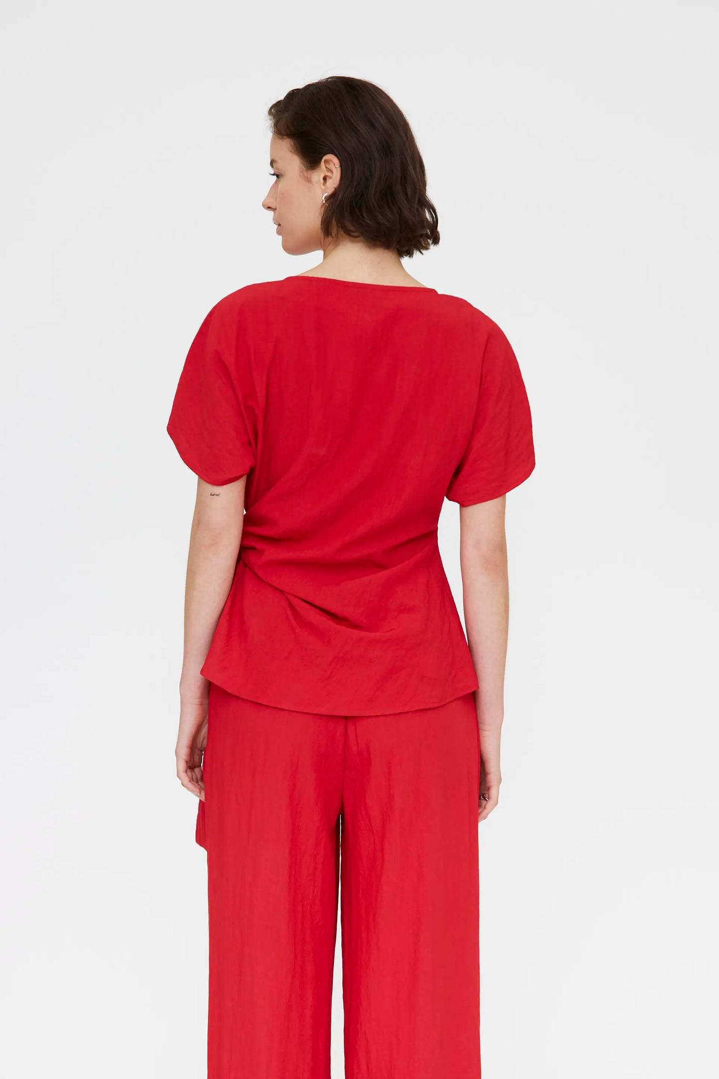 Top rosso con dettaglio cravatta