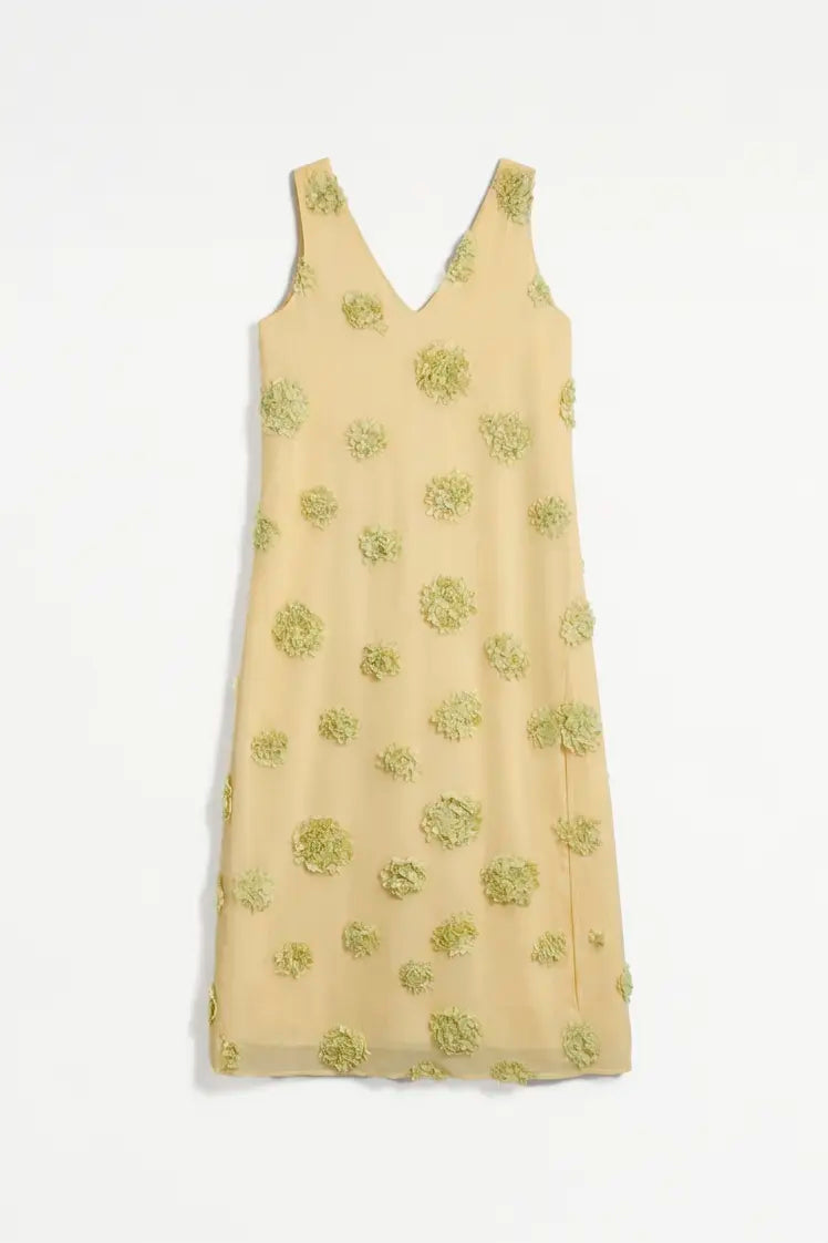Vestido largo amarillo con detalle floral