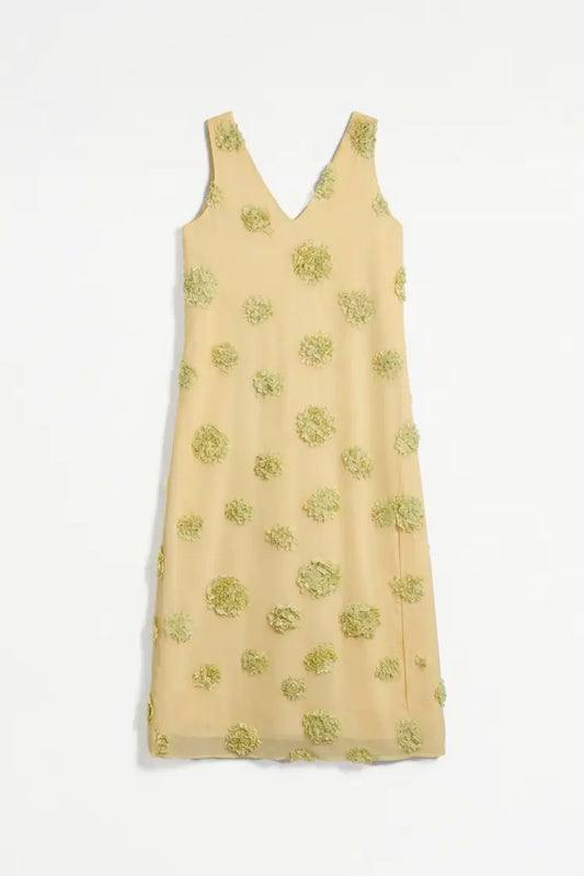 Vestido largo amarillo con detalle floral