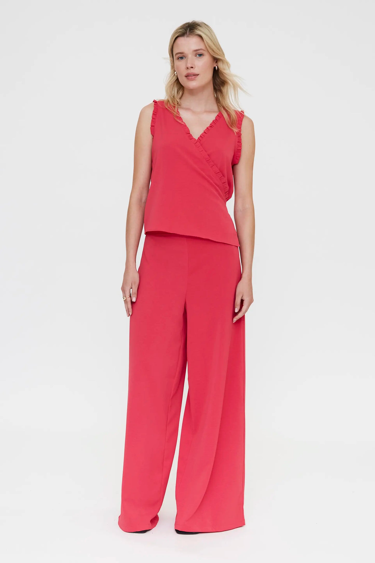 Top fucsia con scollo a V