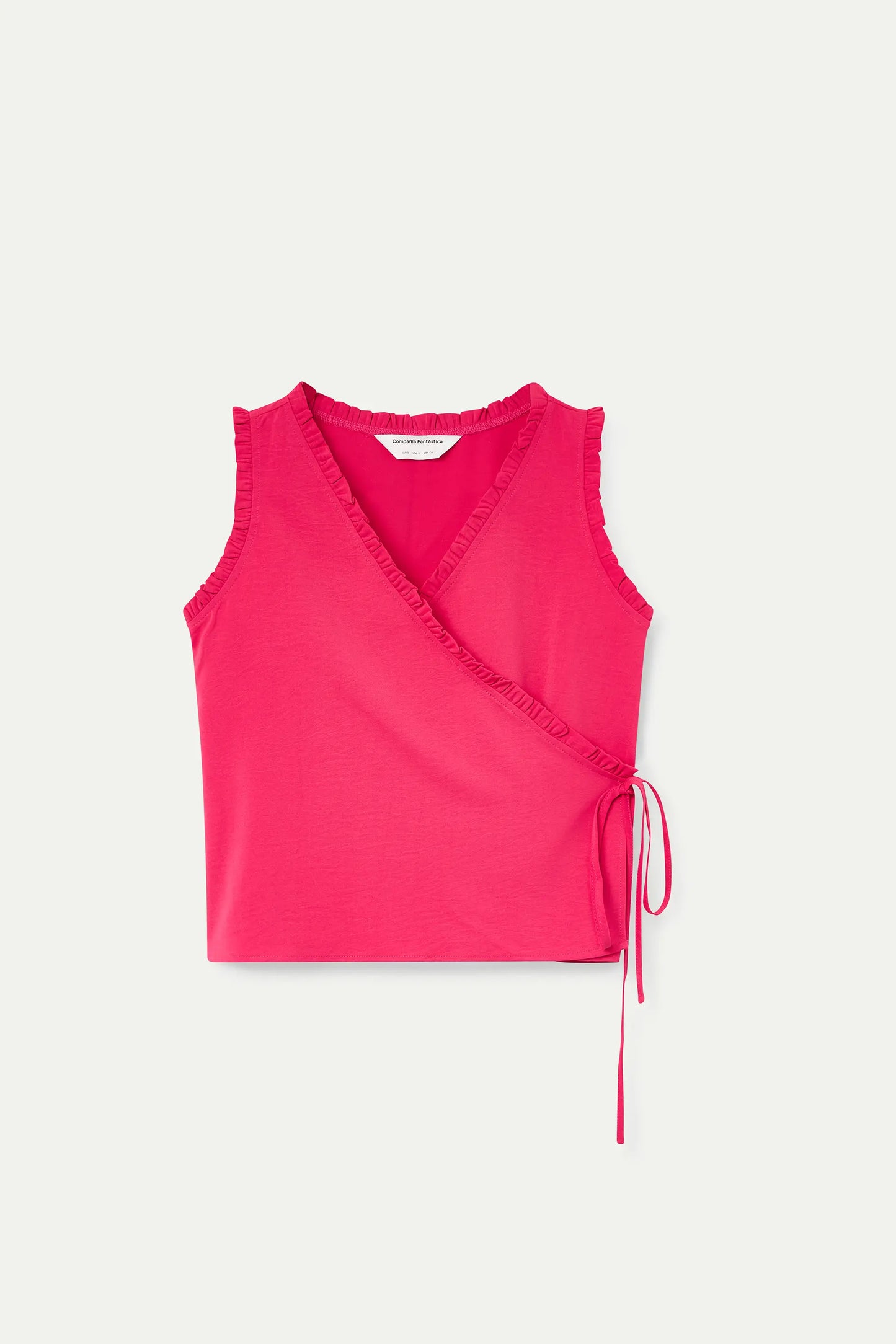 Top fucsia con scollo a V