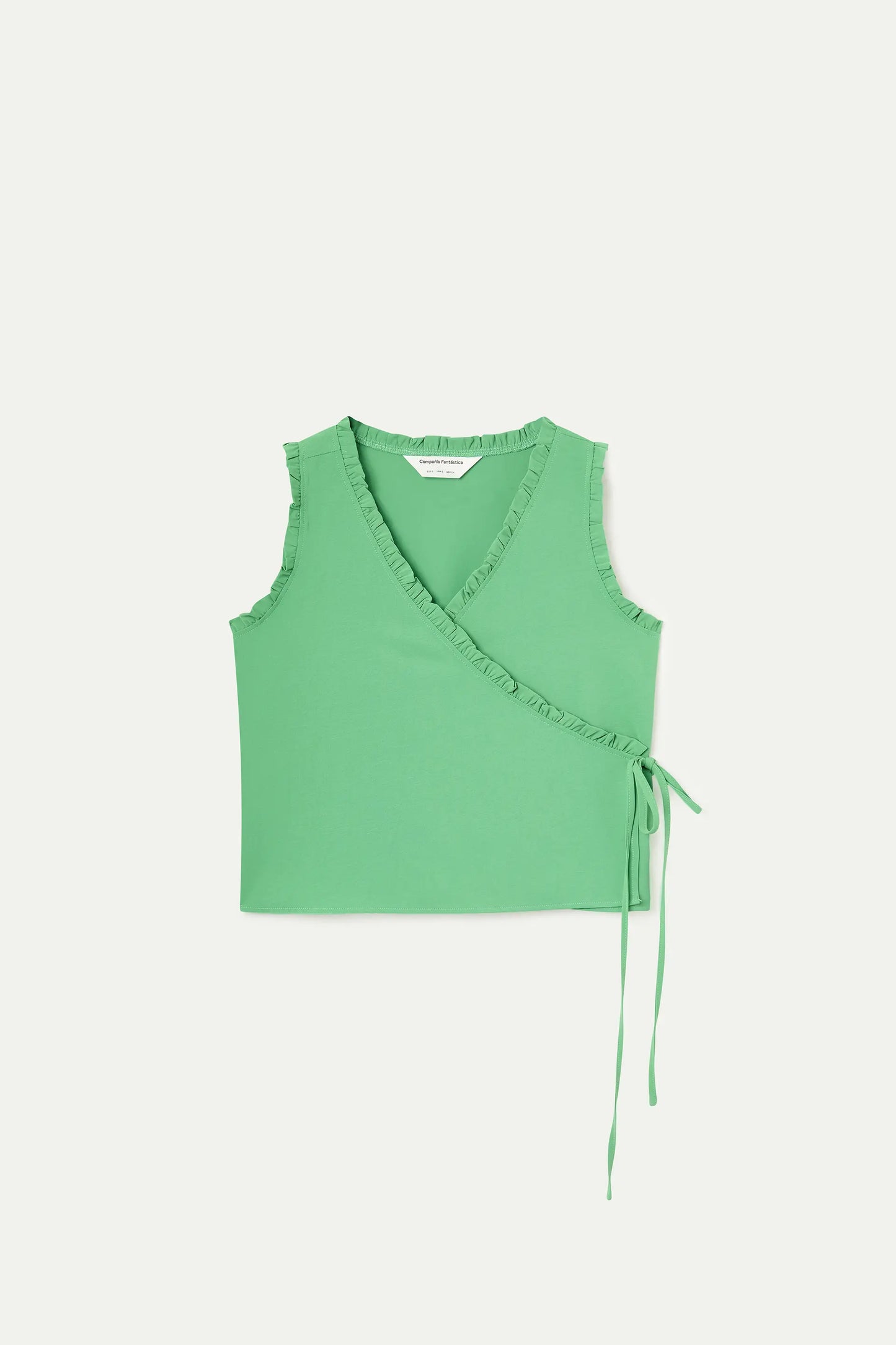 Top verde con escote pico
