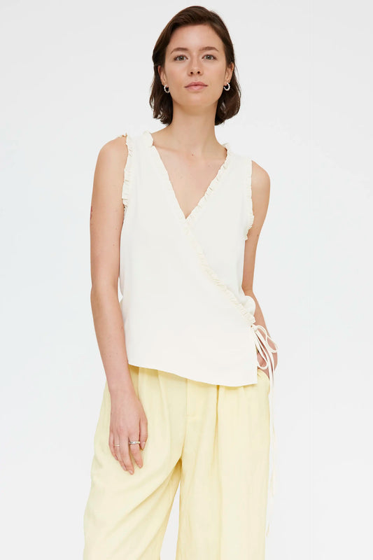 Top bianco sporco con scollo a V