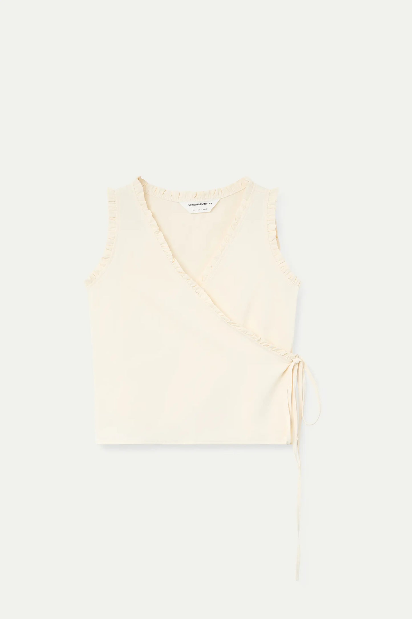 Top bianco sporco con scollo a V