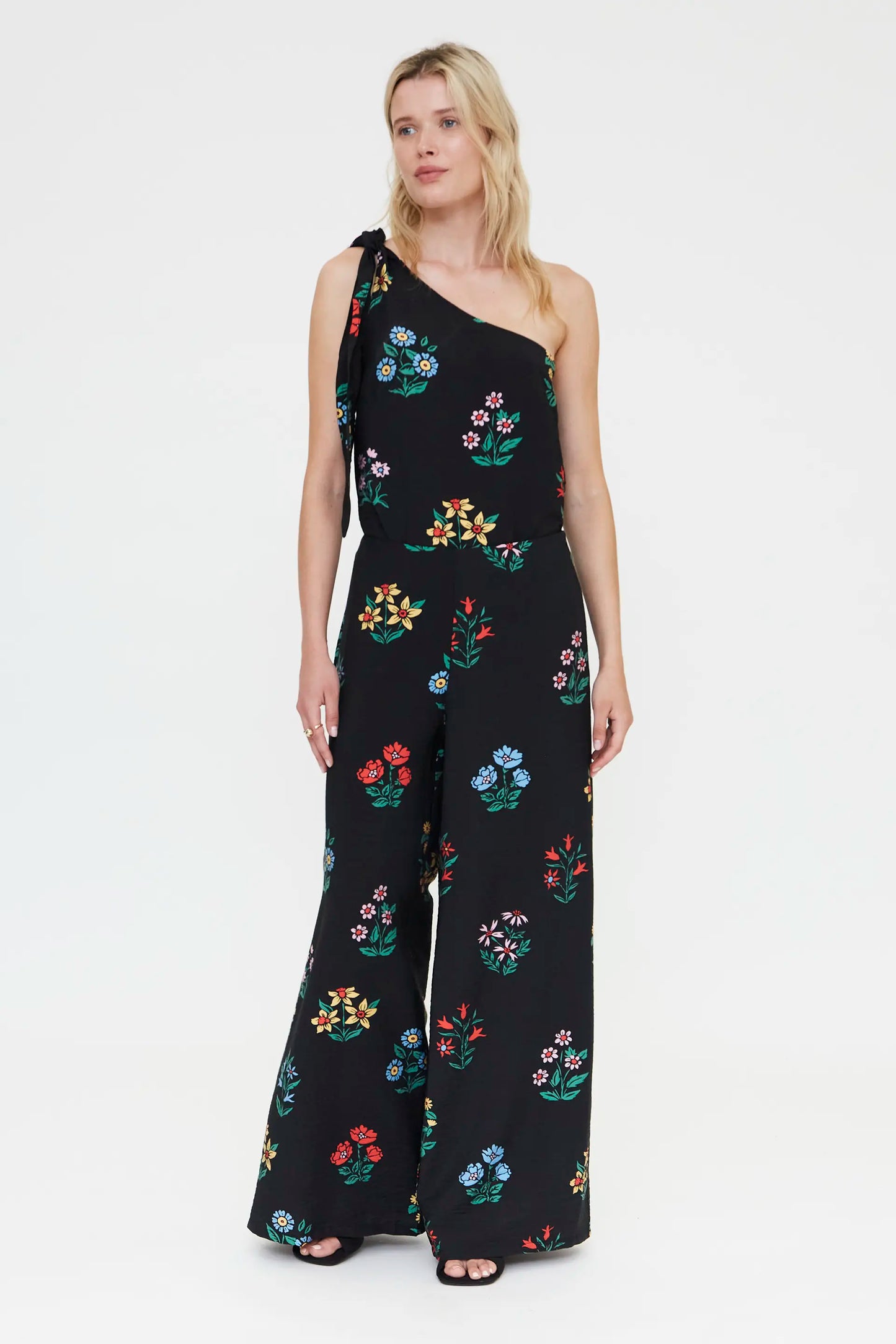 Pantaloni con stampa giardiniere multicolore