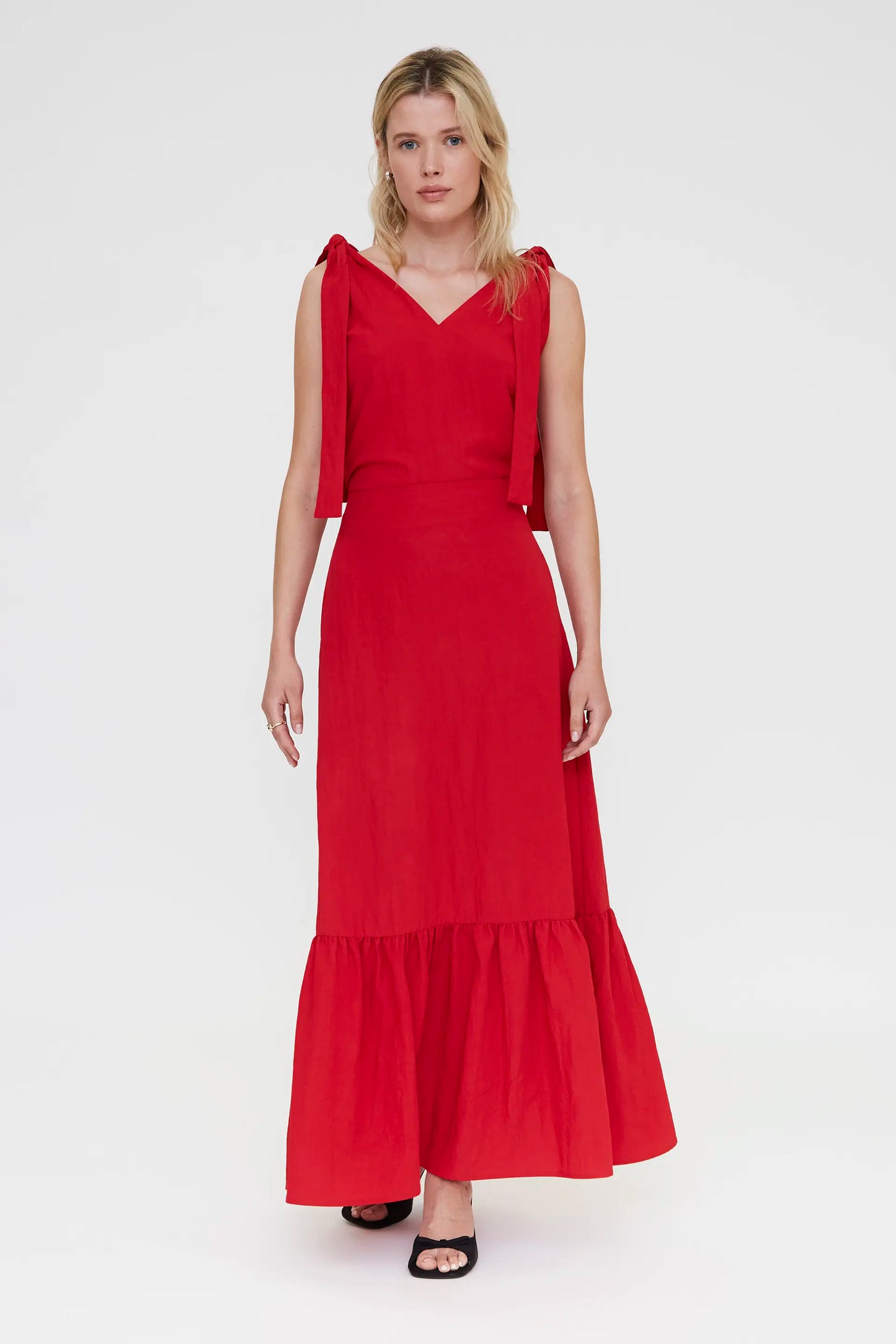 Top rosso asimmetrico con scollo a V