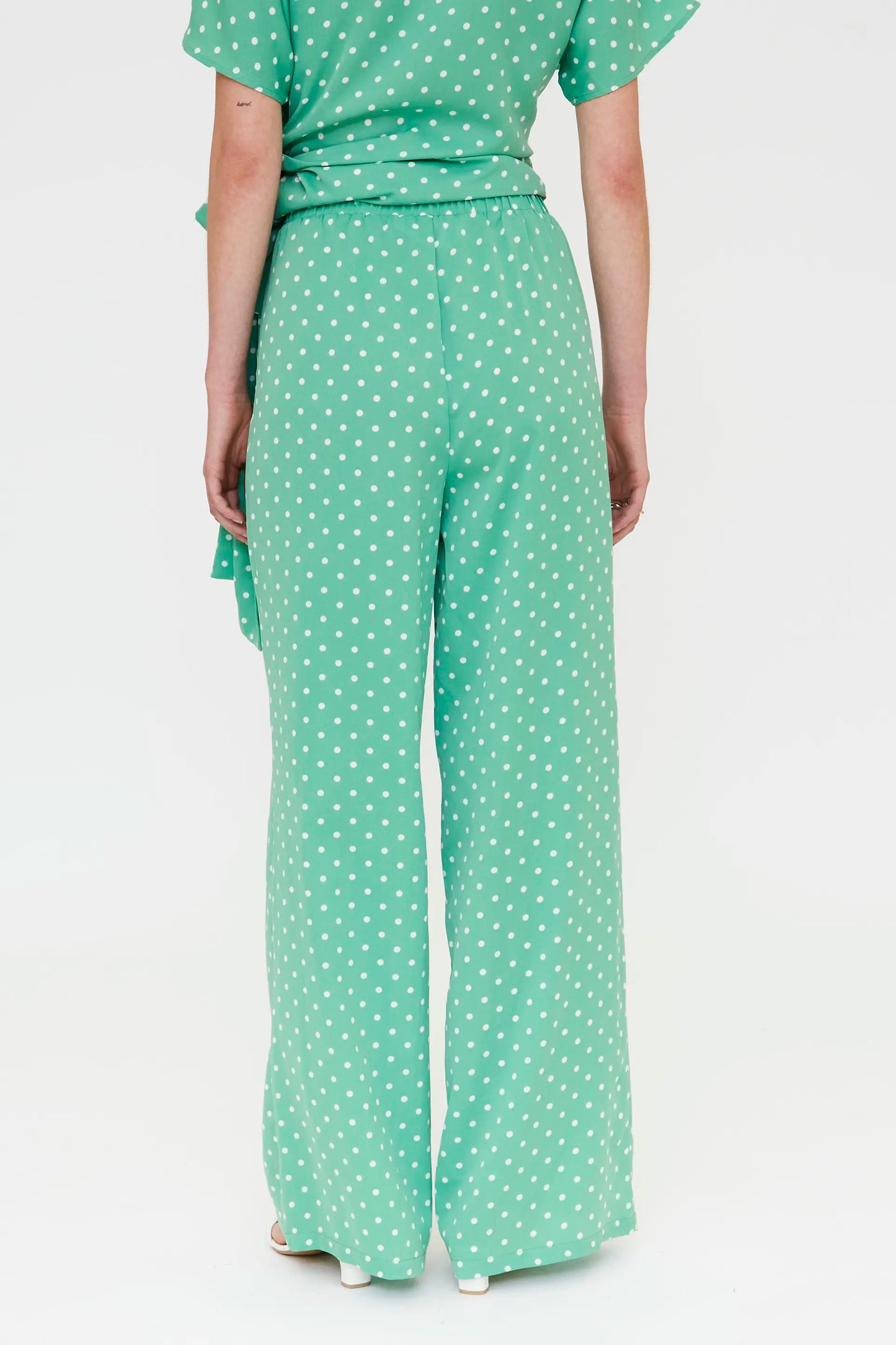 Pantaloni con stampa a mini pois verdi