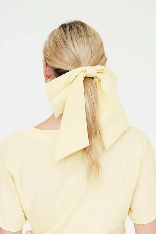 Coletero lazo amarillo claro